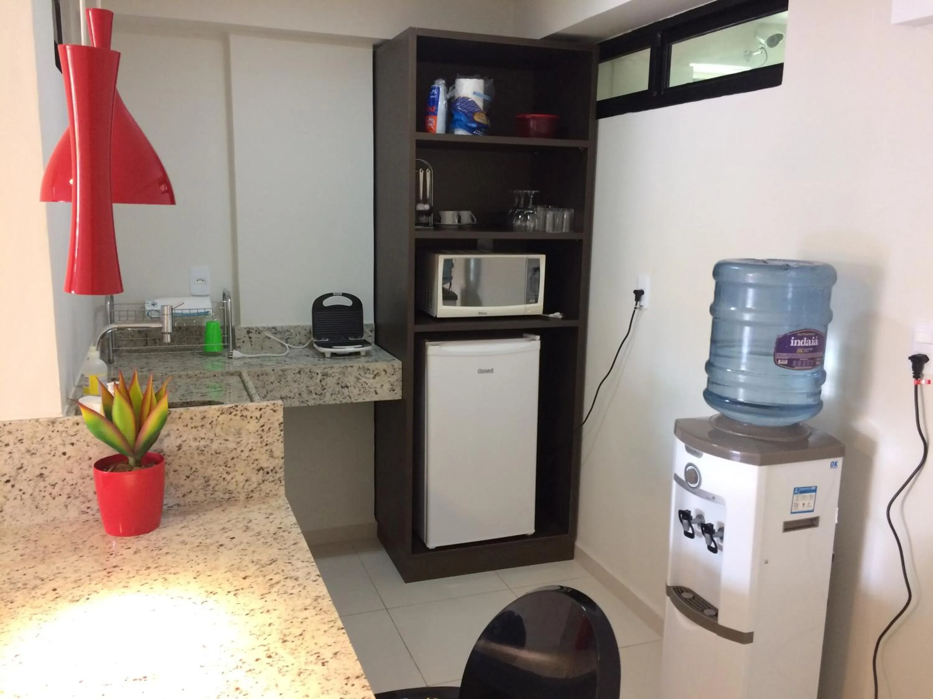 Kitchen or kitchenette in Tabatinga Residence Apart Hotel