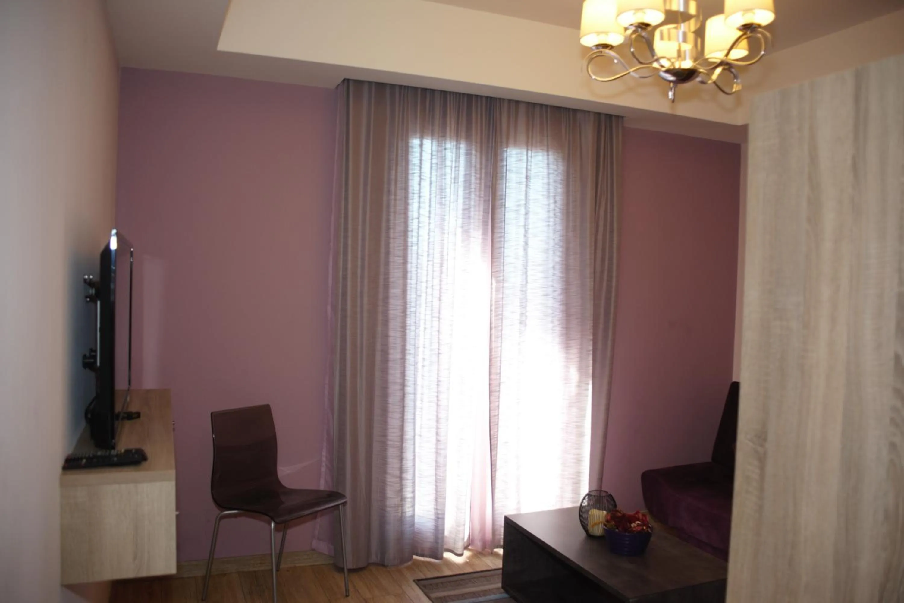 Living room in HOtello guest suites