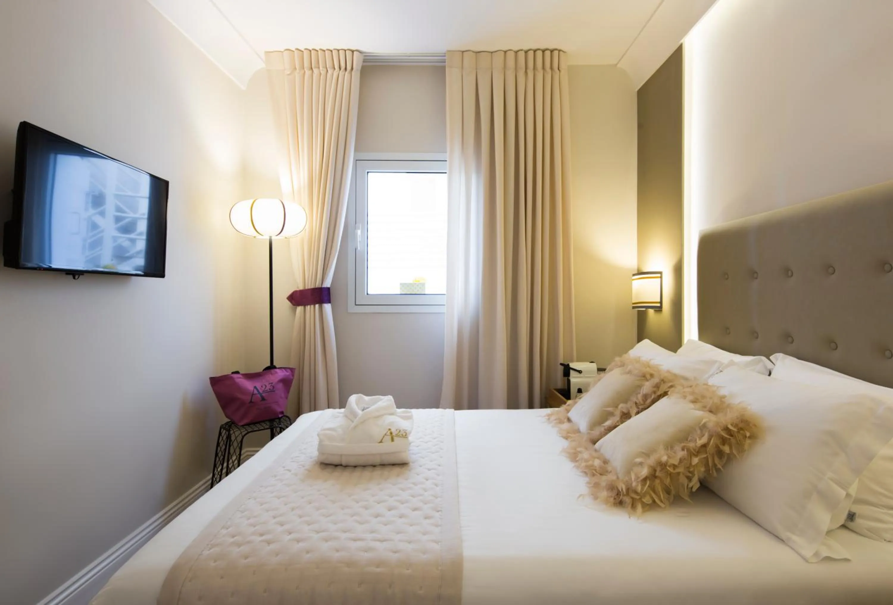 TV and multimedia, Bed in A23 Boutique Hotel