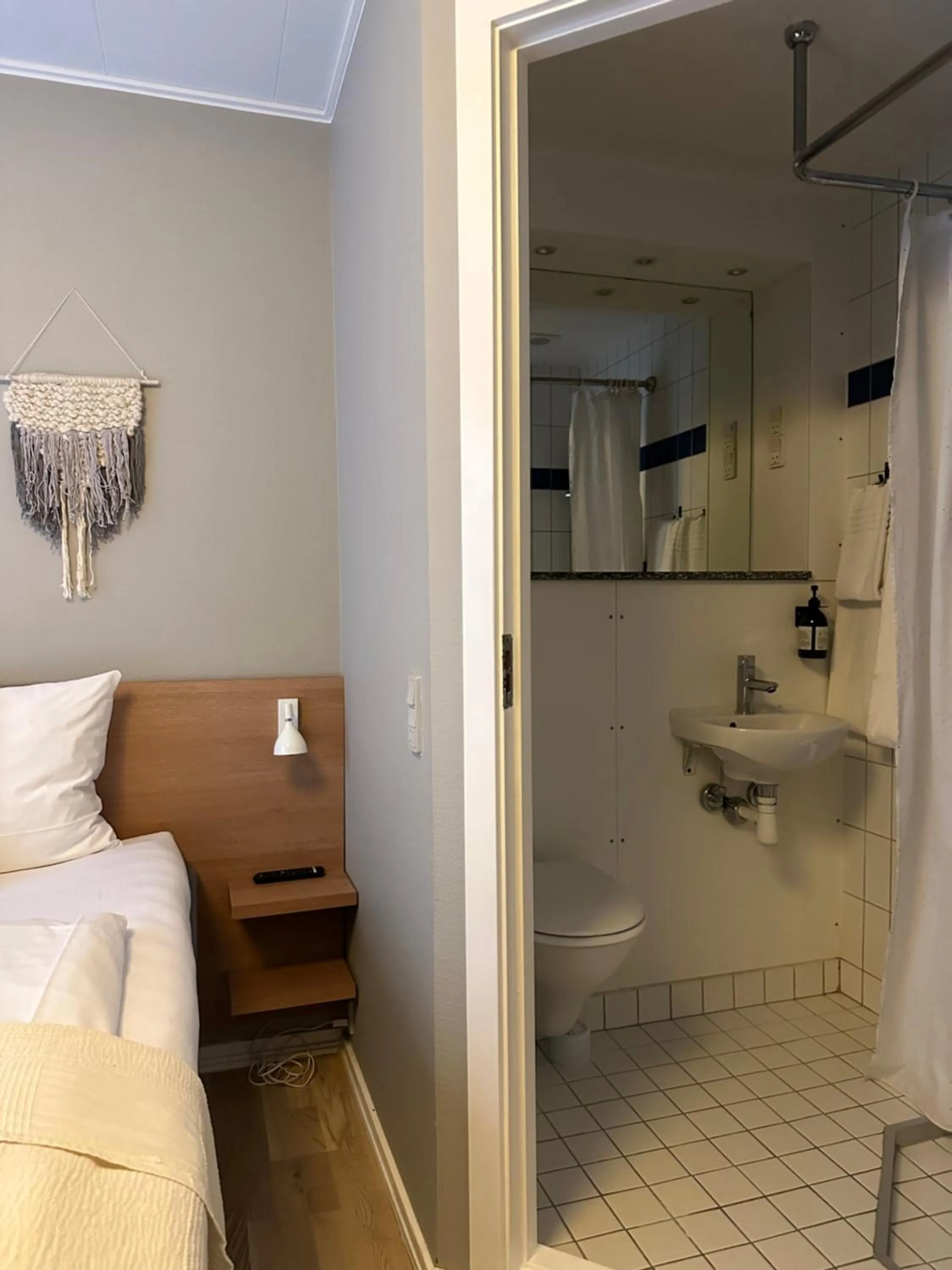 Toilet, Bed in Savoy Hotel