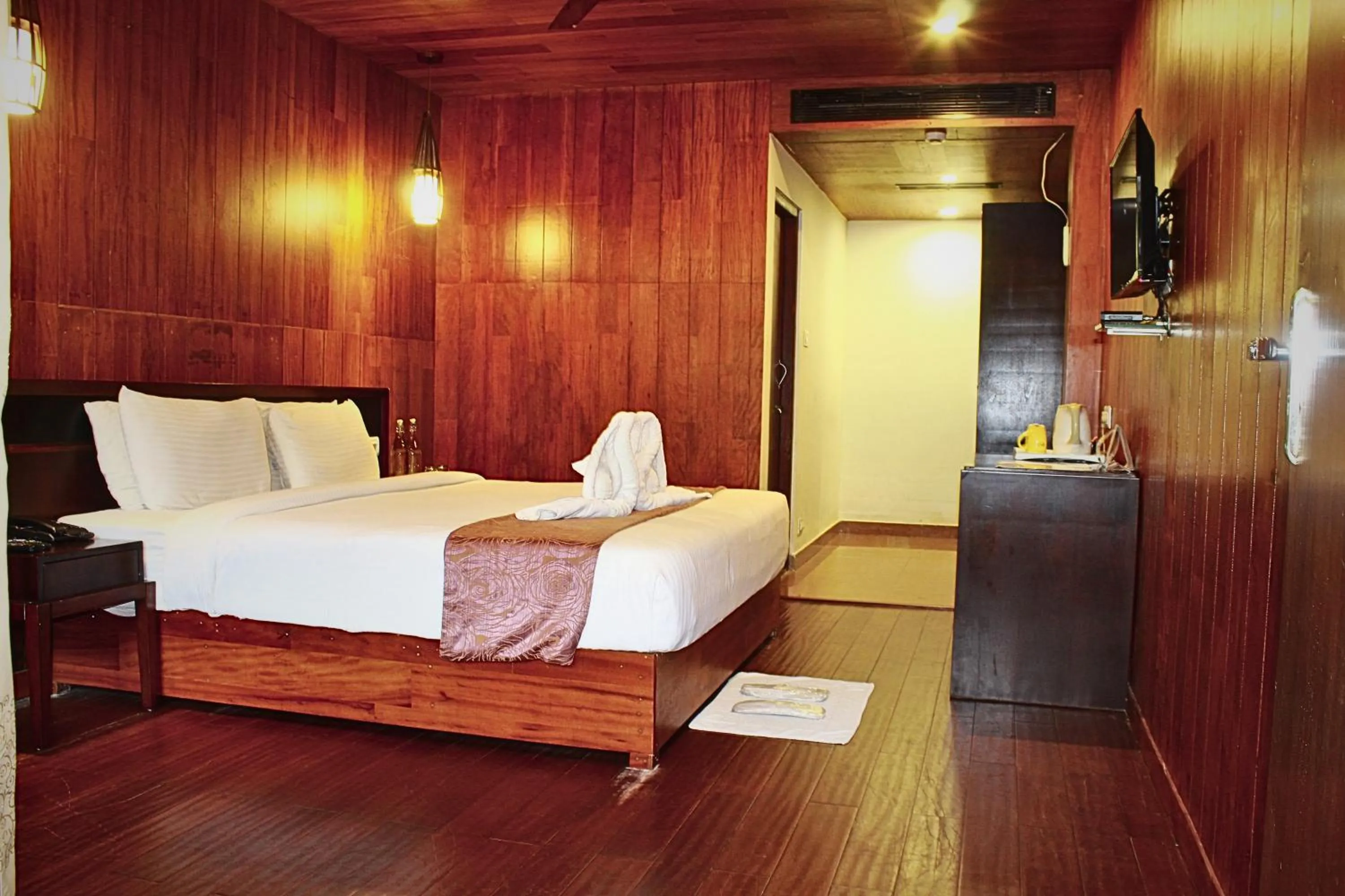 Bed in TSG Blue Resort & Spa