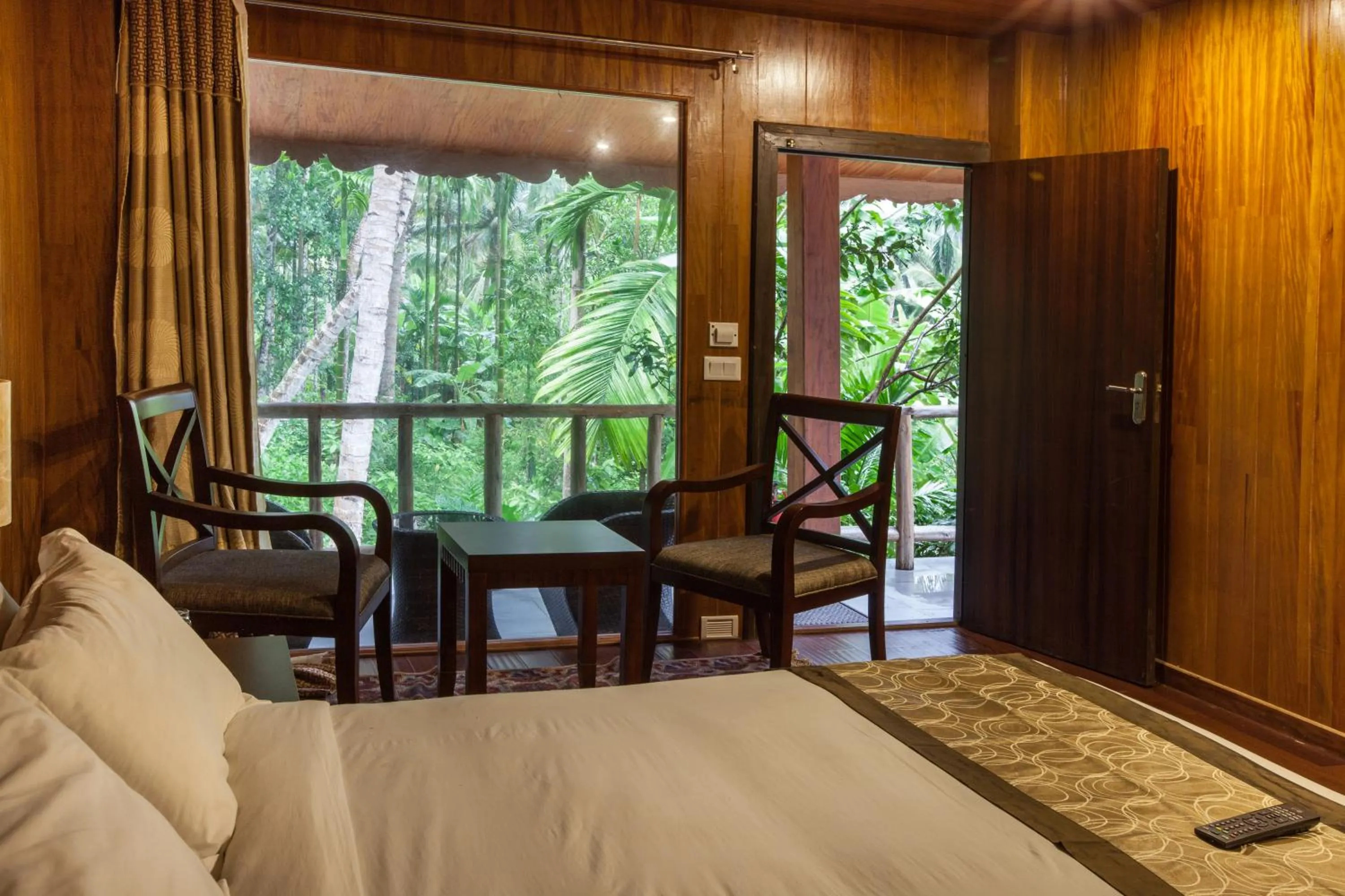 Living room, Bed in TSG Blue Resort & Spa