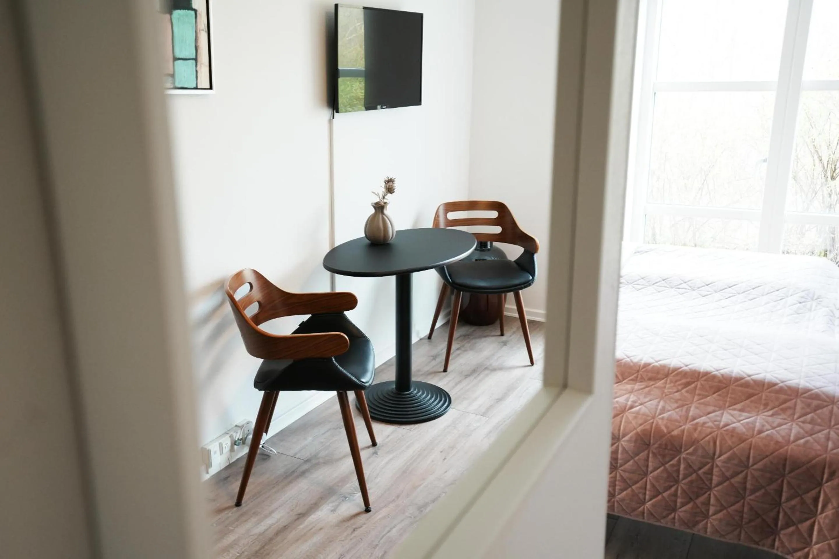 Seating area, Bed in Hotel Aarslev Kro