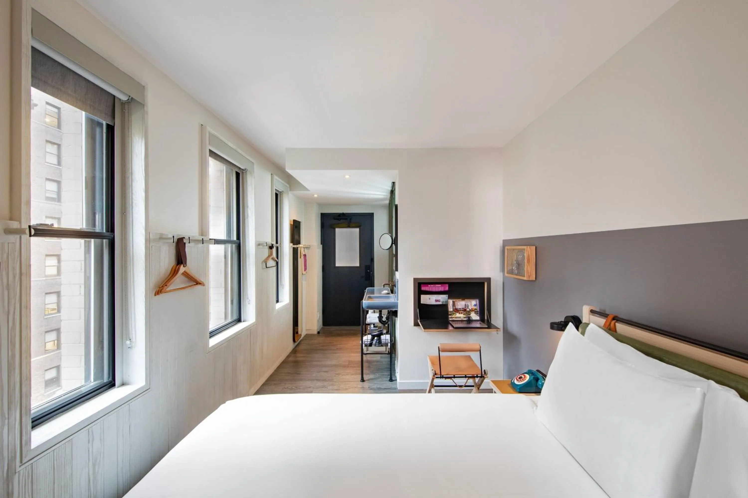 Photo of the whole room, Bed in MOXY NYC Times Square