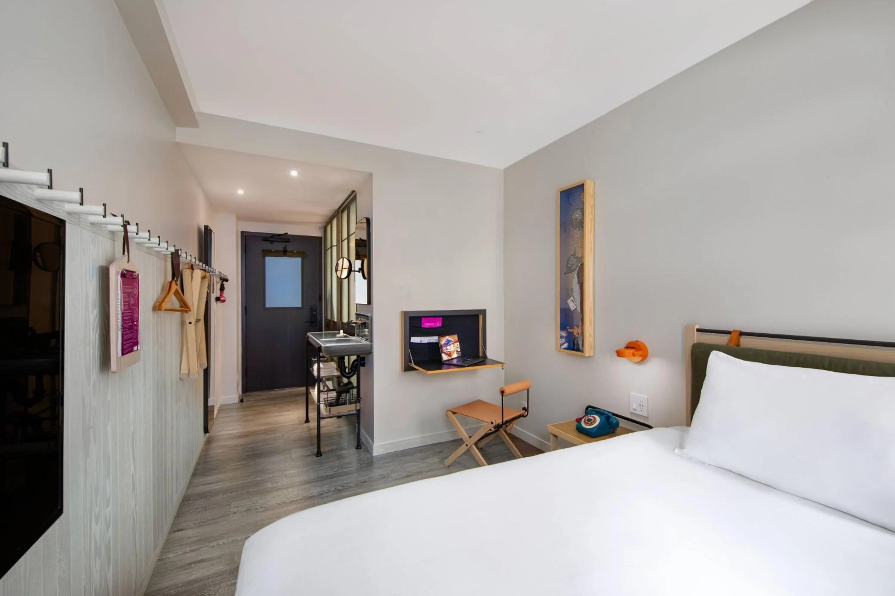 Photo of the whole room, Bed in MOXY NYC Times Square