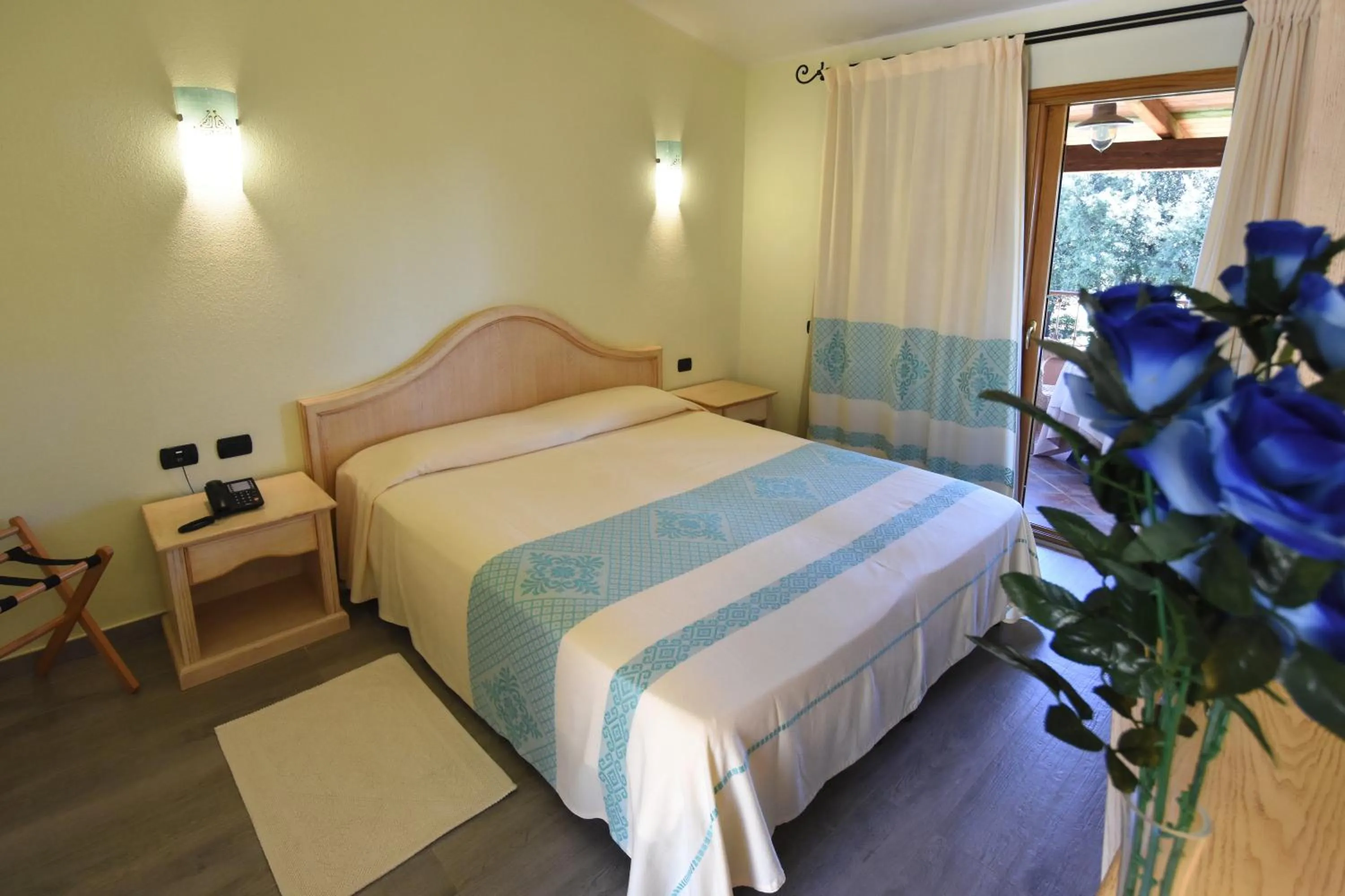 Bed in Hotel Su Giganti