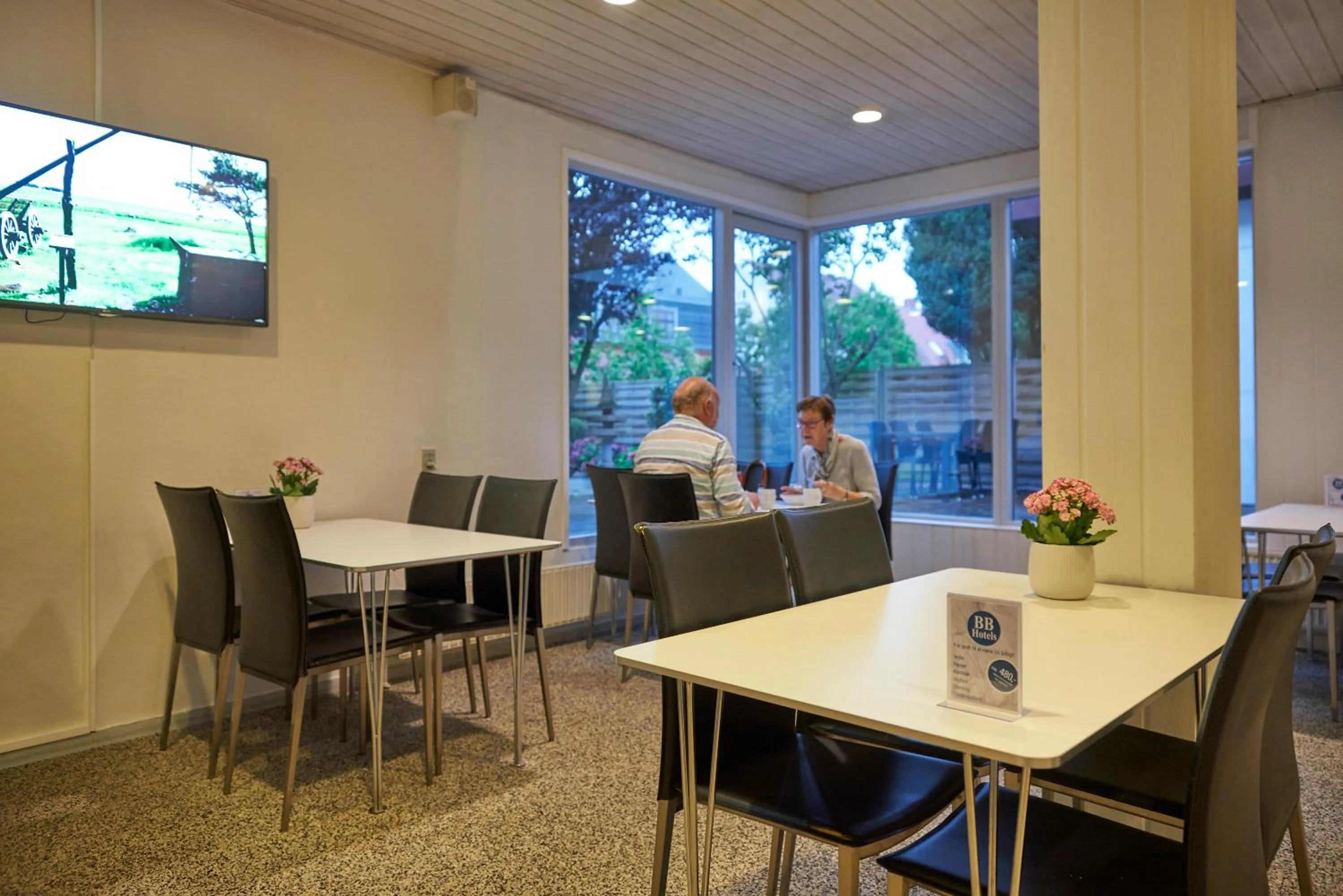 Communal lounge/ TV room in BB-Hotel Frederikshavn Turisthotellet