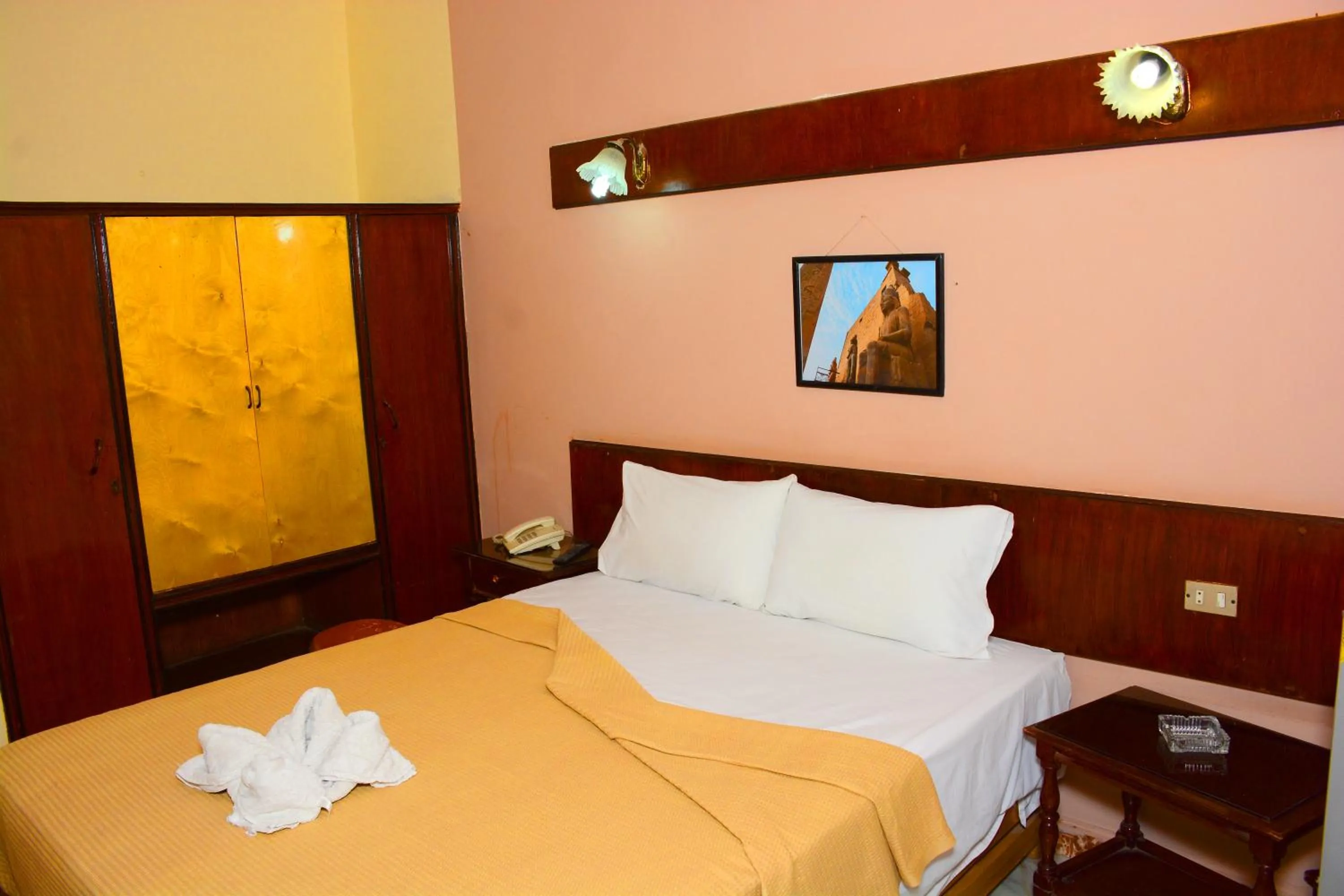 Bed in Shady Hotel Luxor