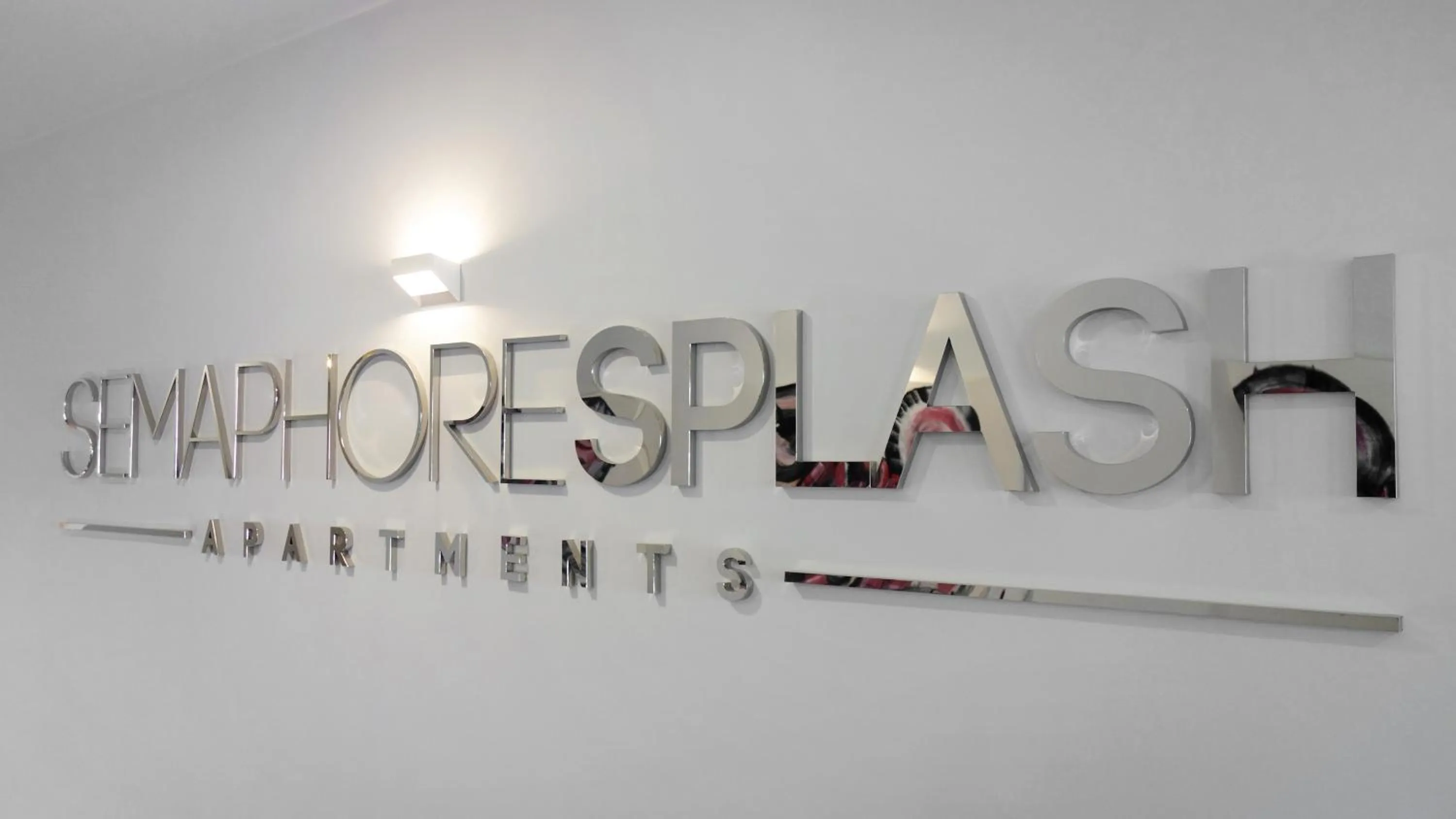 Property logo or sign in Semaphore Splash Apartments