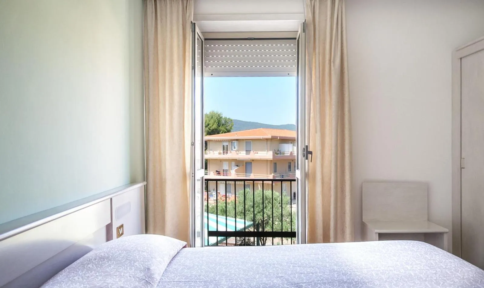 Bed in Hotel Al Gabbiano