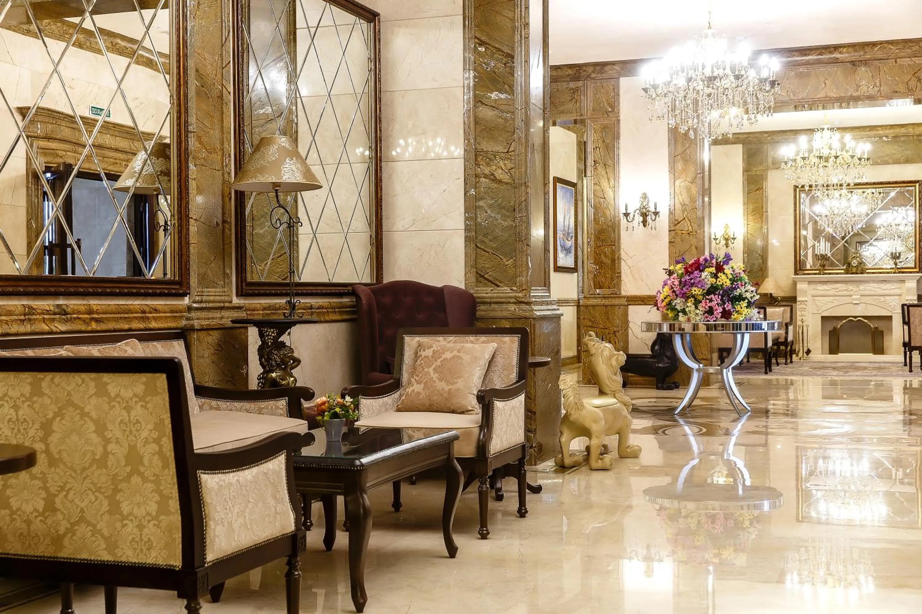 Communal lounge/ TV room in Alanda Hotel