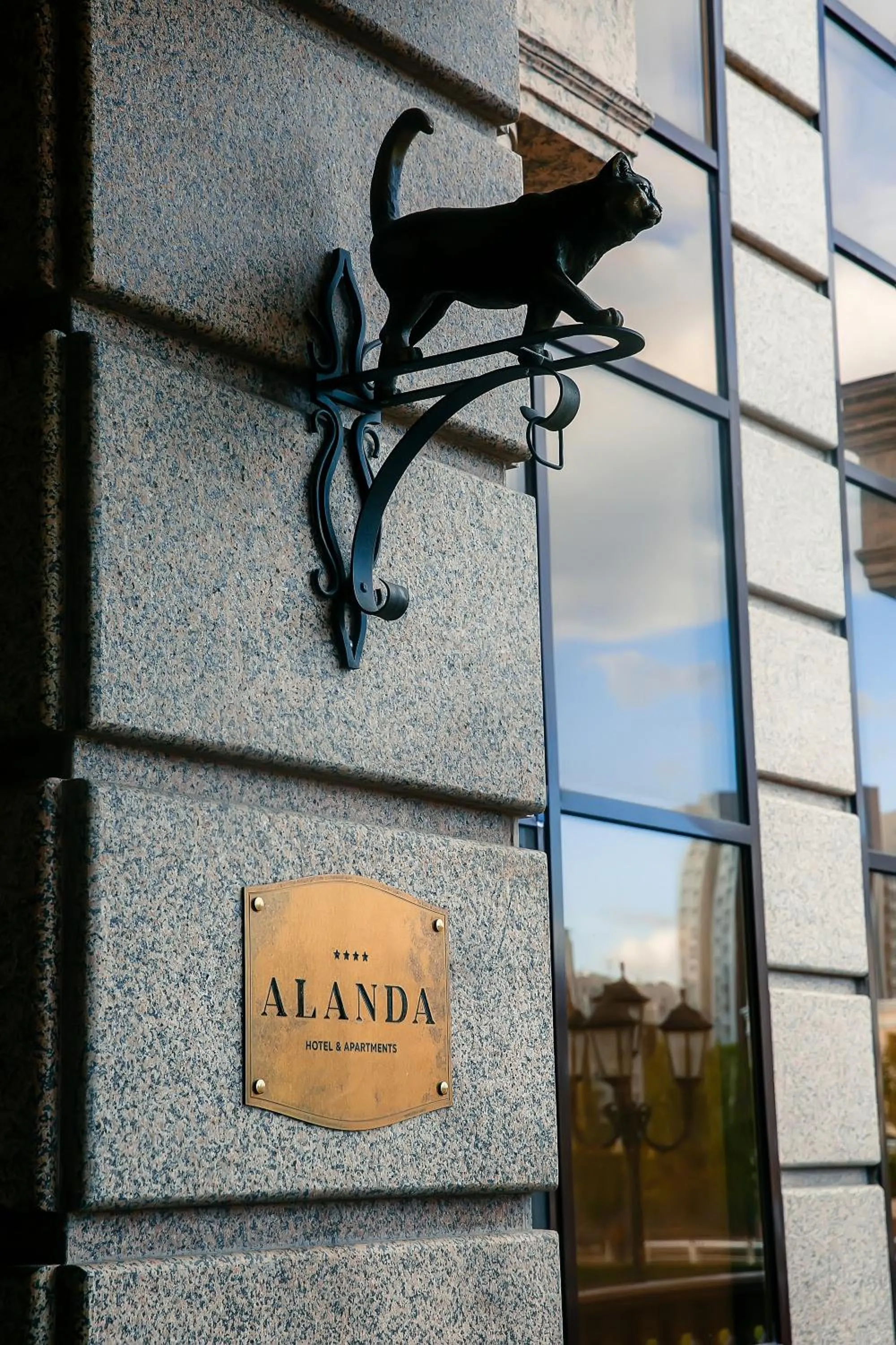 Property logo or sign in Alanda Hotel