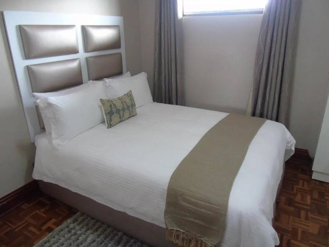 Bed in The Musafer Travel Lodge