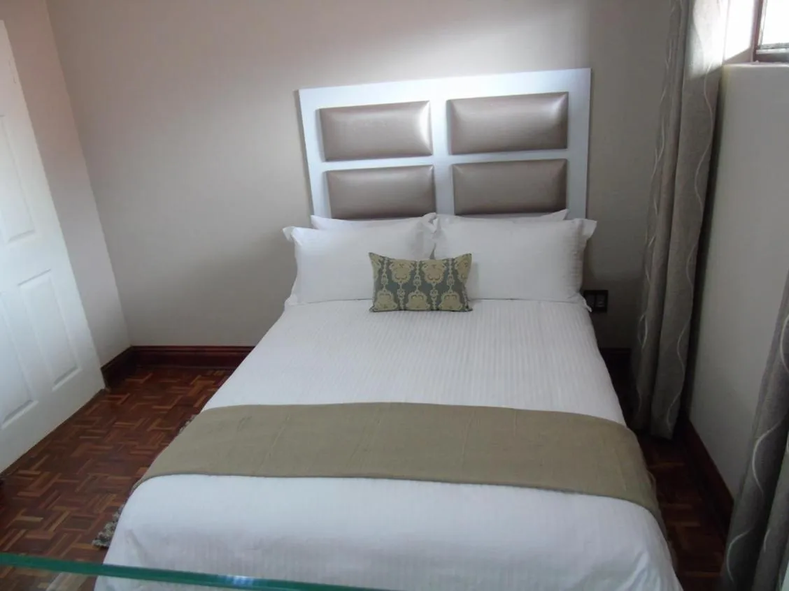 Bed in The Musafer Travel Lodge