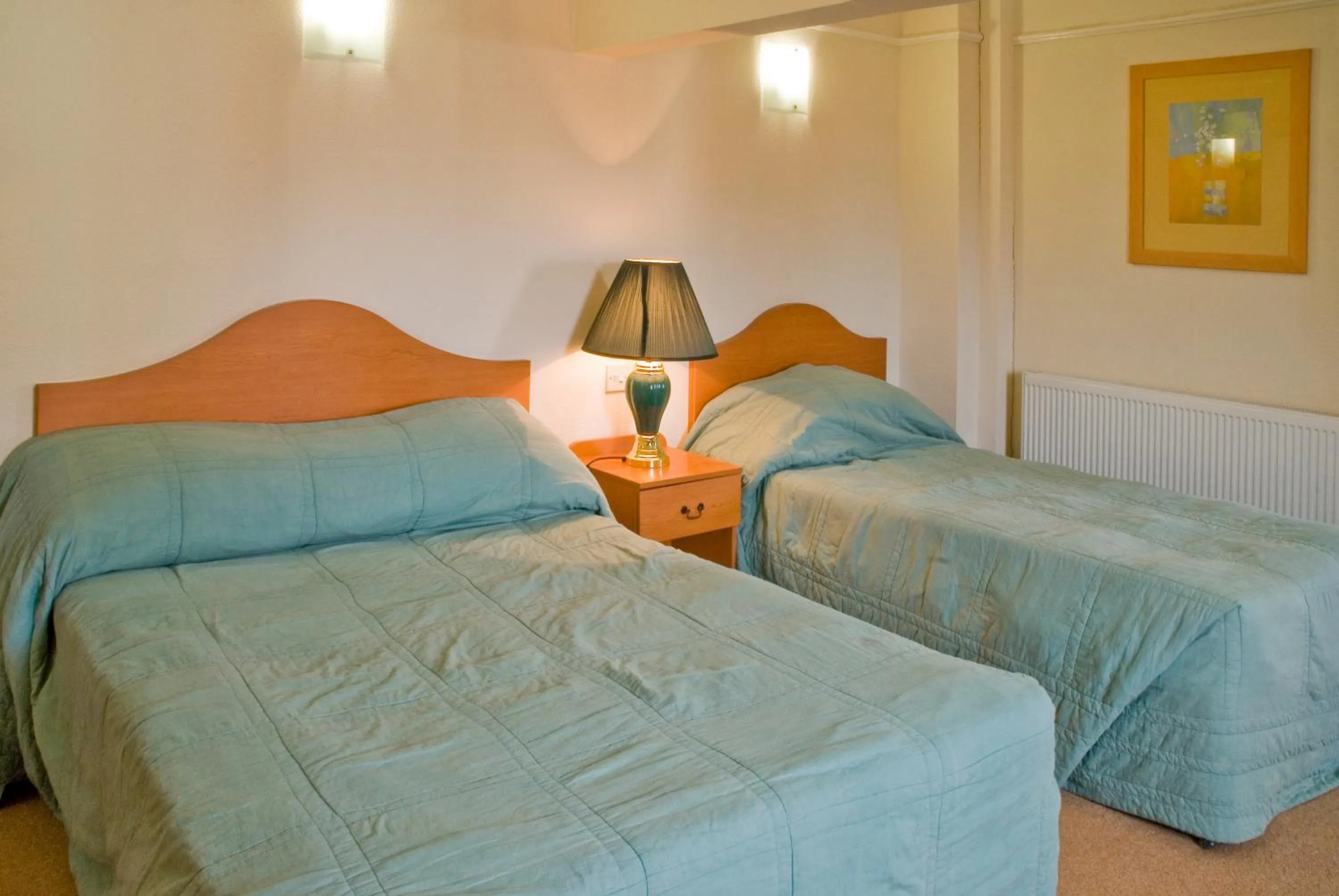 Bed in The Metropole Hotel