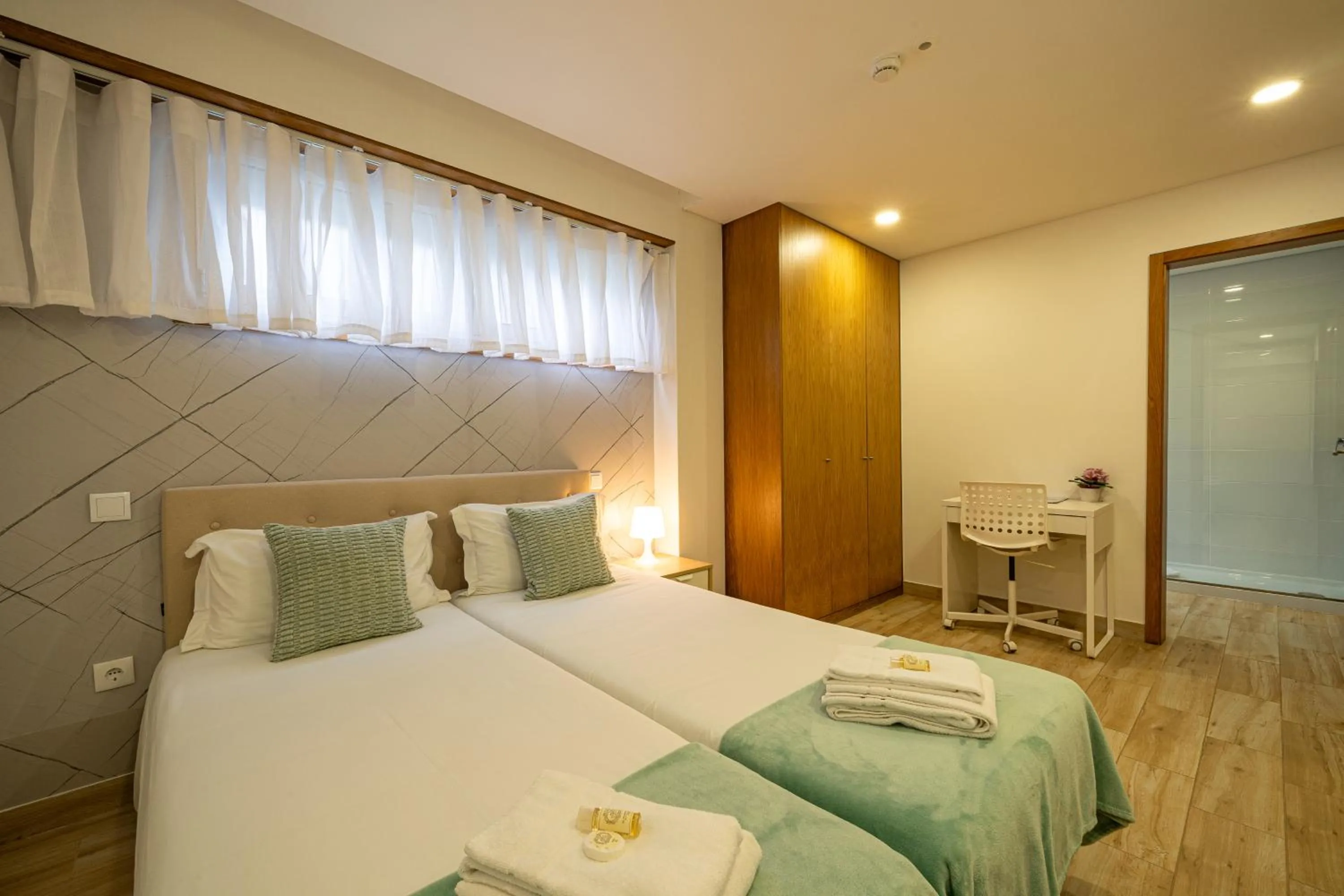 Bed in Central Suites