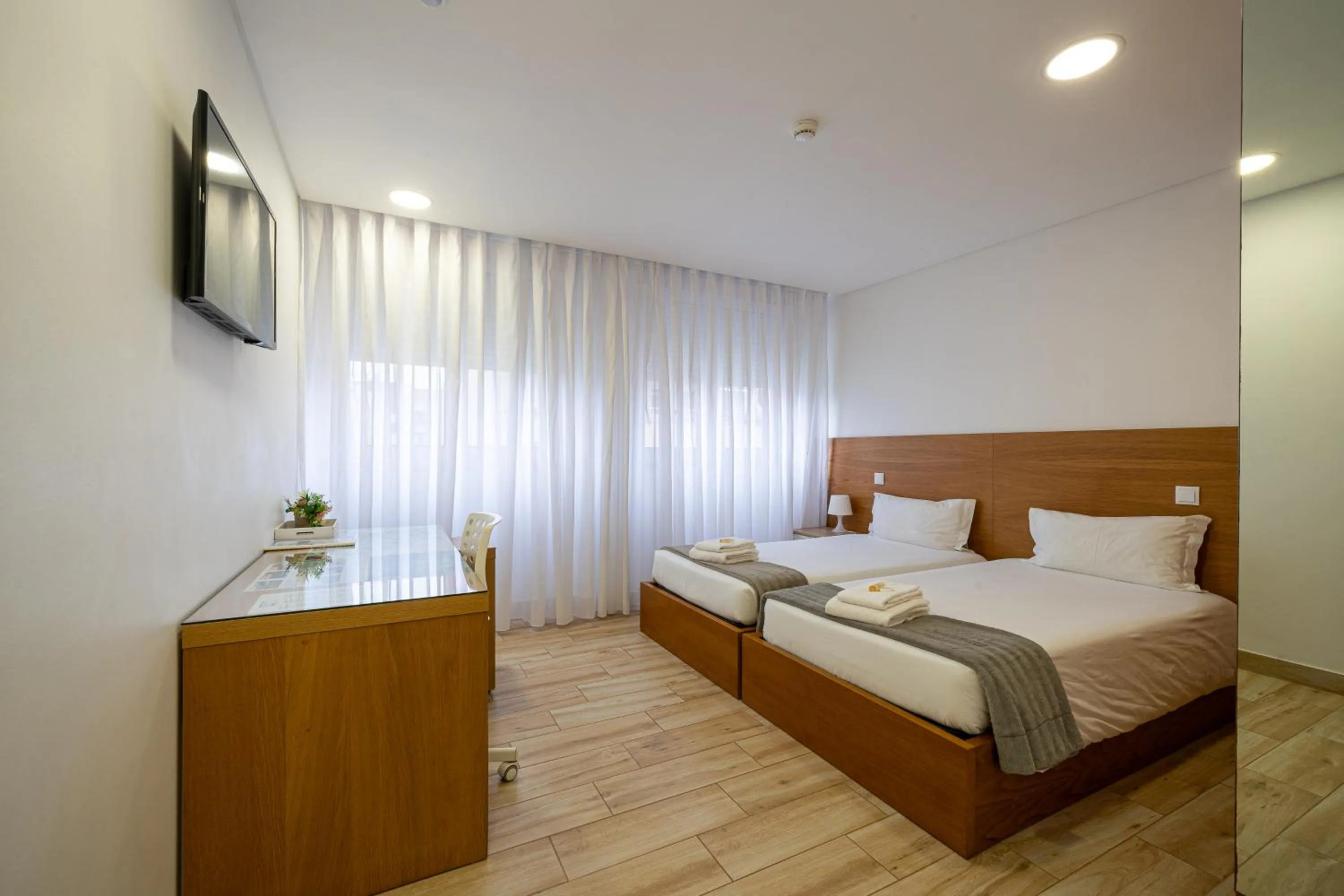 Bed in Central Suites