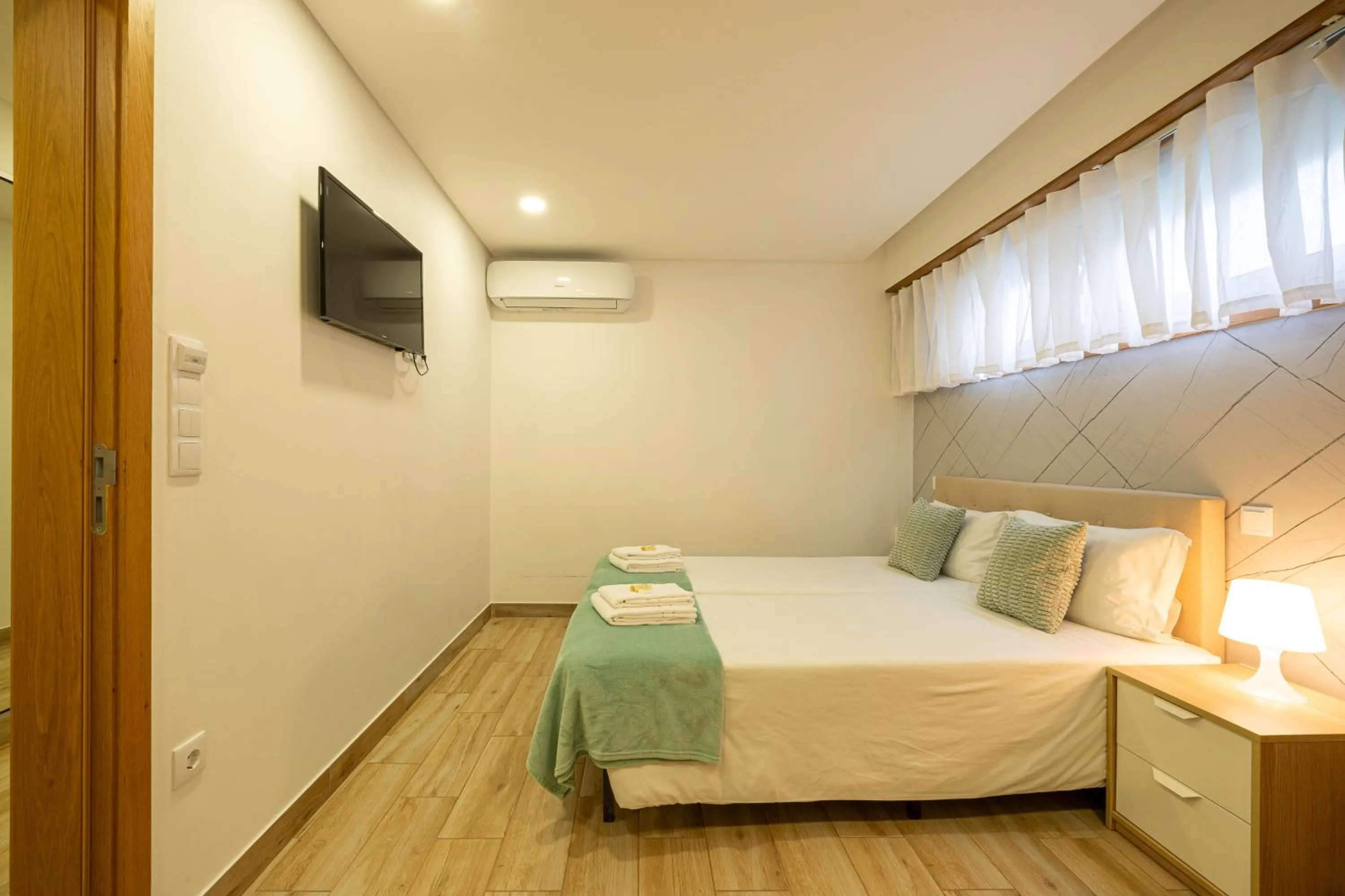 Bed in Central Suites