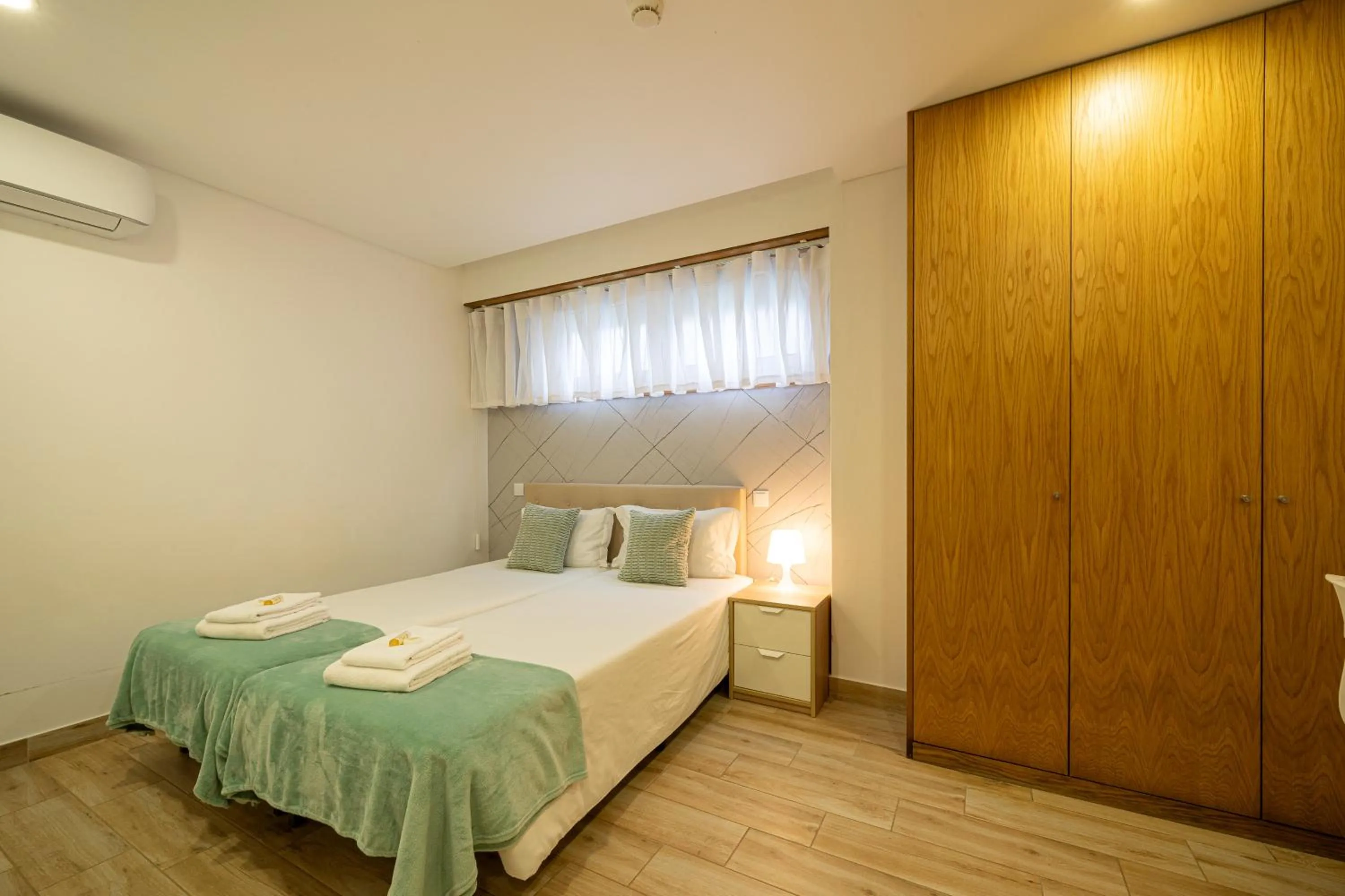 Bed in Central Suites