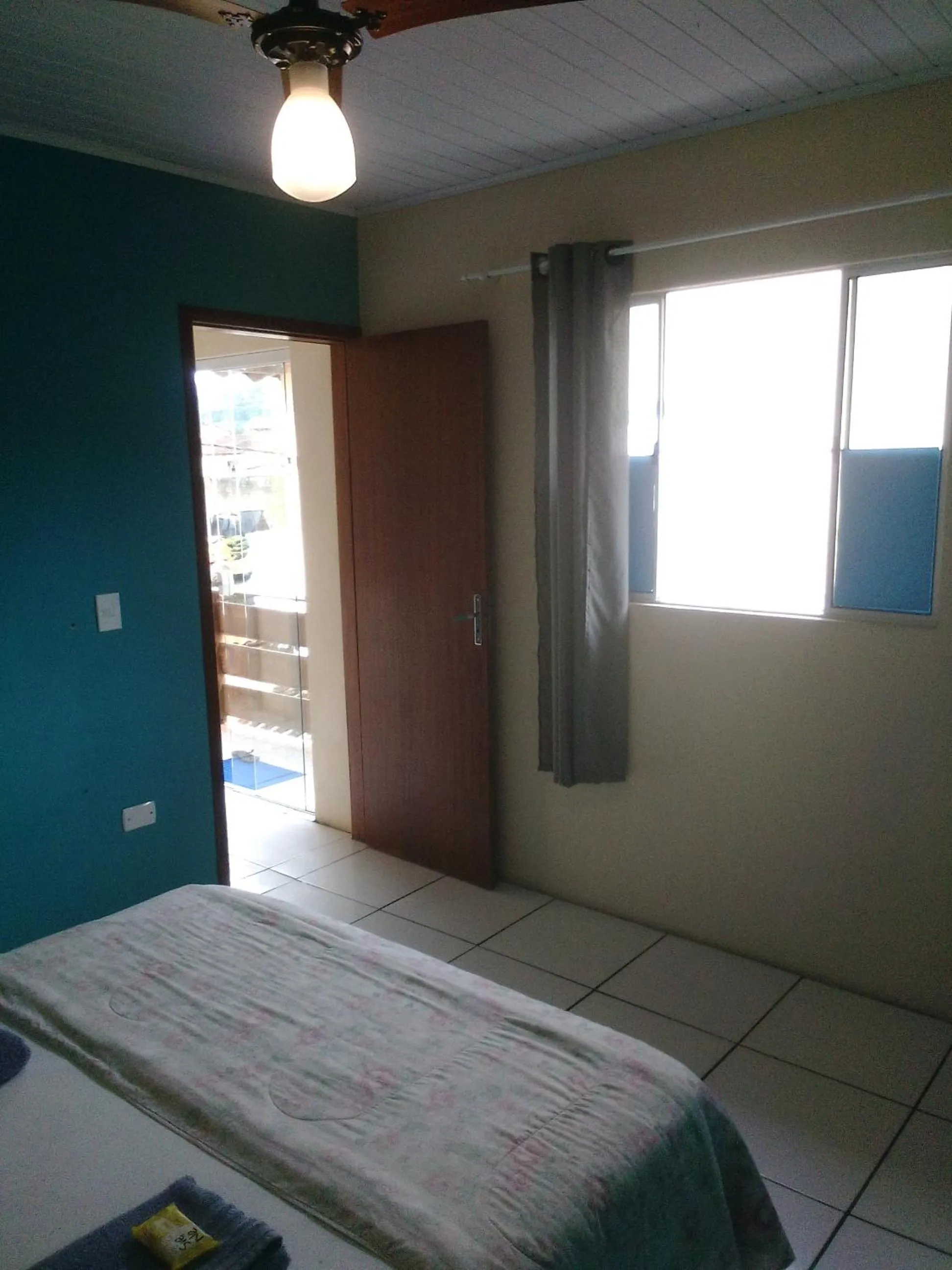 Bed in Hospedagem Pousada Fantasia Paraty