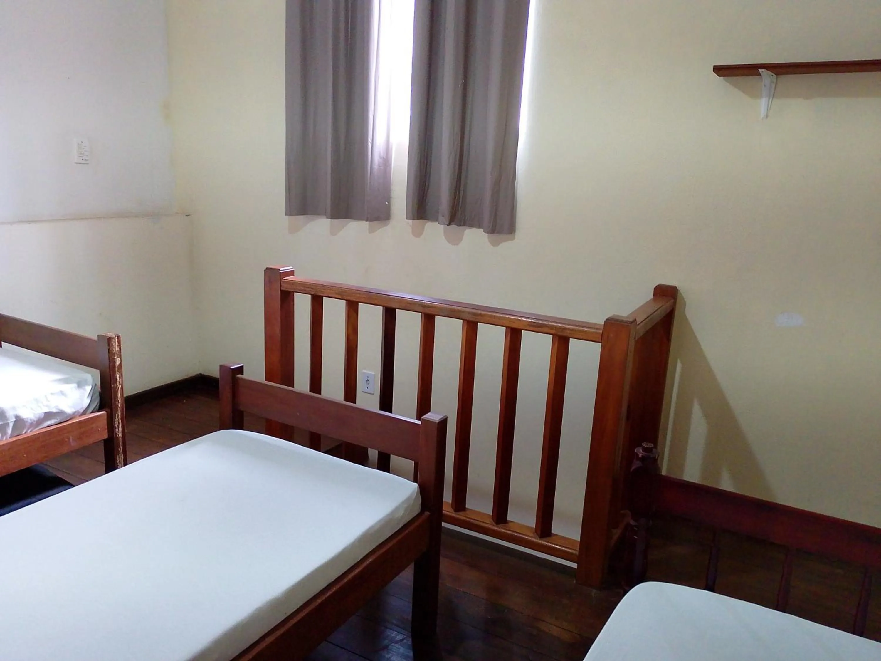 Bed in Hospedagem Pousada Fantasia Paraty