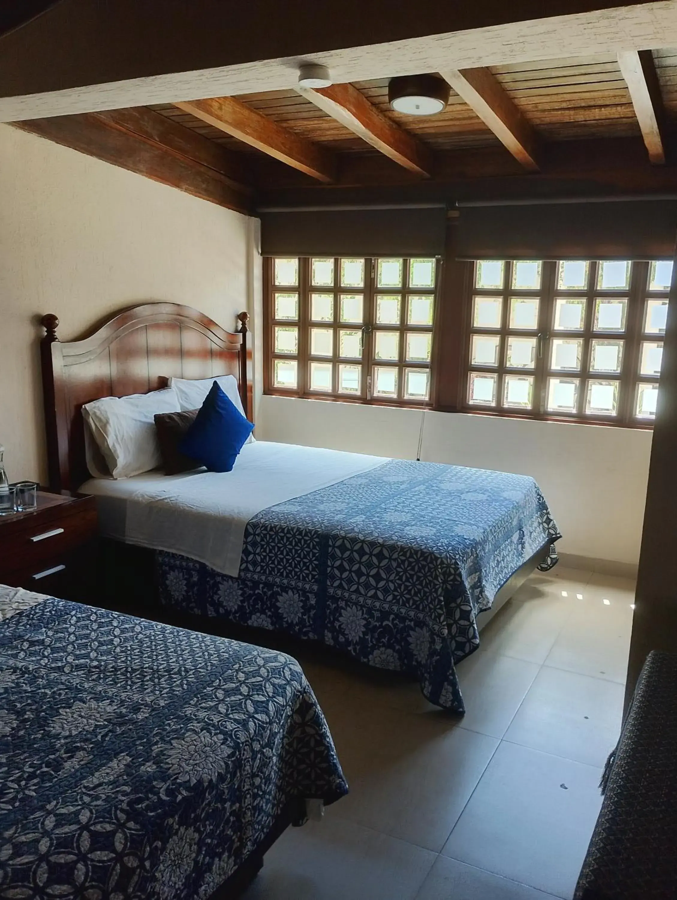 Deluxe Queen Room with Two Queen Beds in Bed and Breakfast Pecarí Deluxe Queen Room with Two Queen Beds in Bed and Breakfast Pecarí