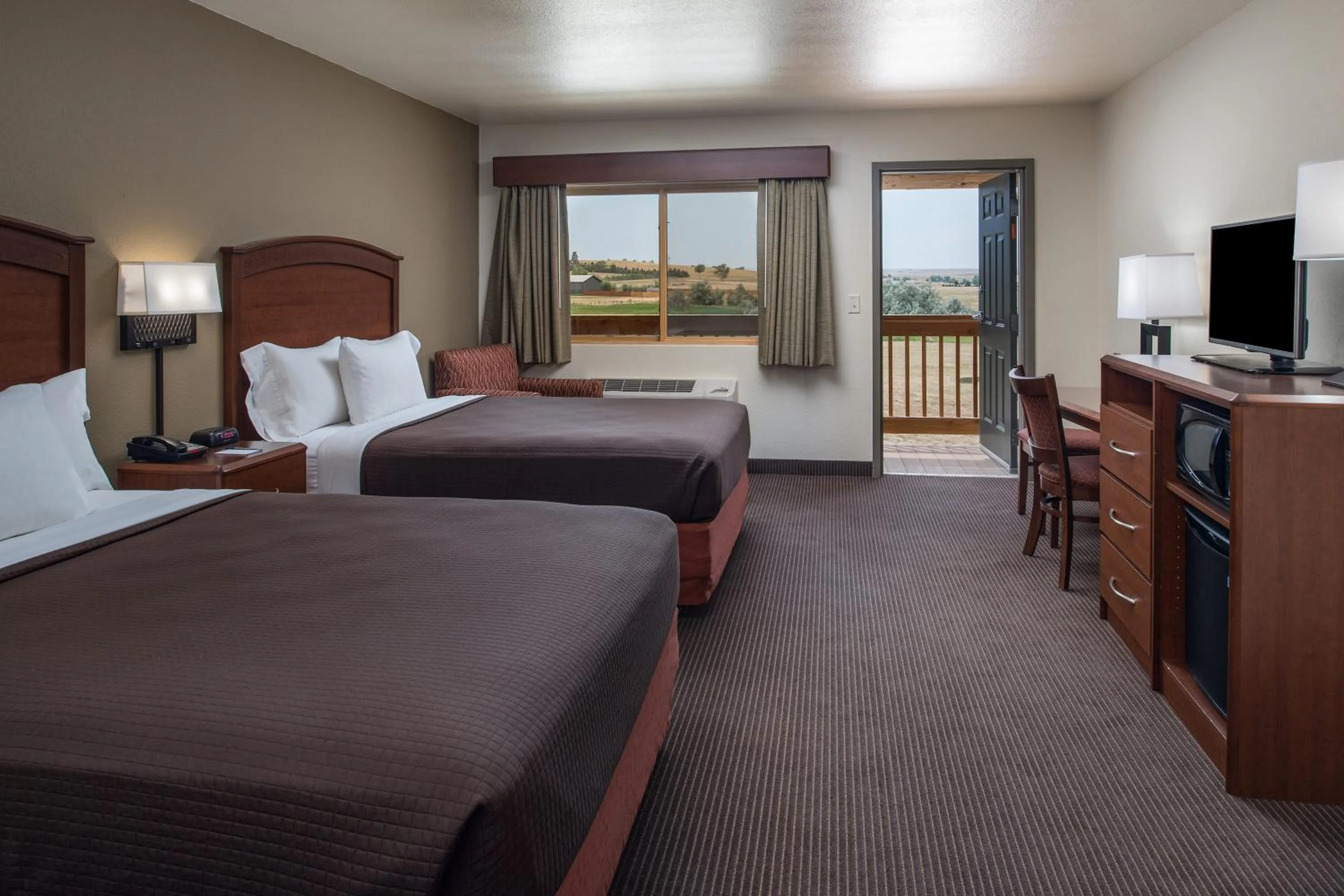 Photo of the whole room, Bed in AmericInn by Wyndham Belle Fourche