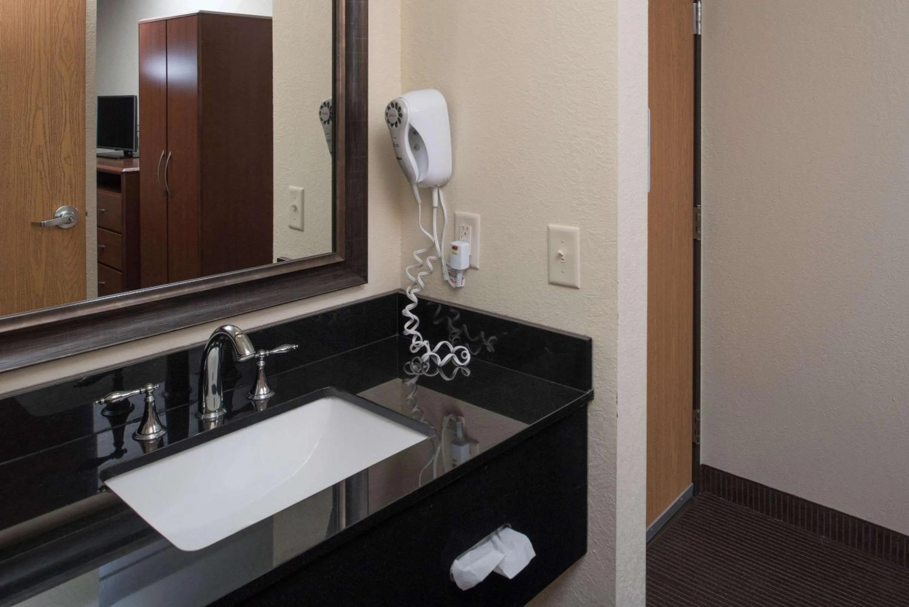 Photo of the whole room in AmericInn by Wyndham Belle Fourche