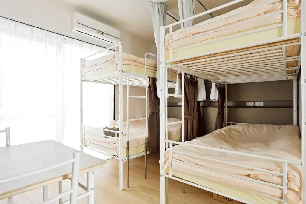 Bed in Keimei Guest House