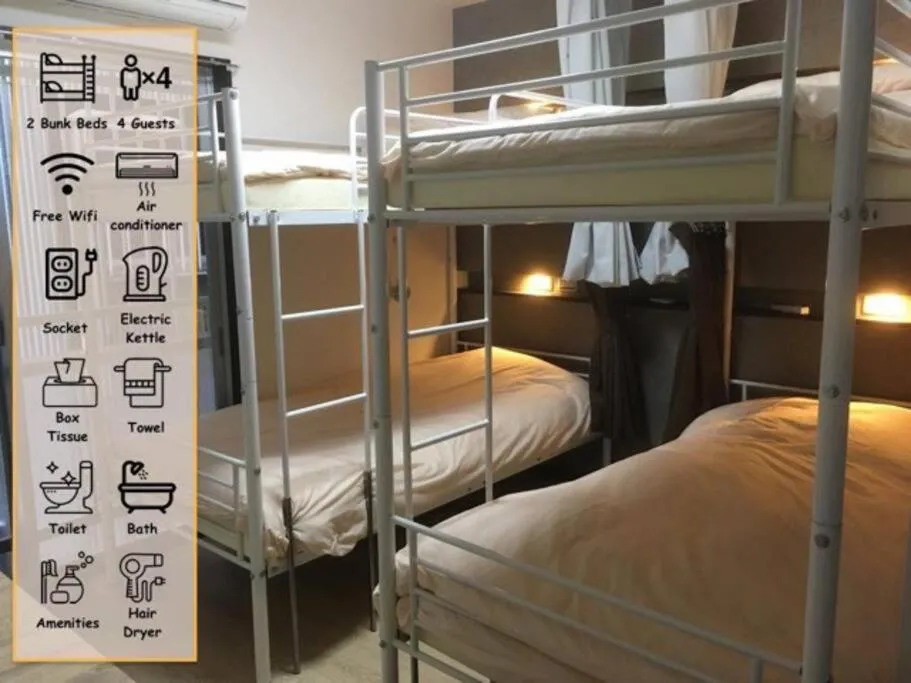 Bed in Keimei Guest House