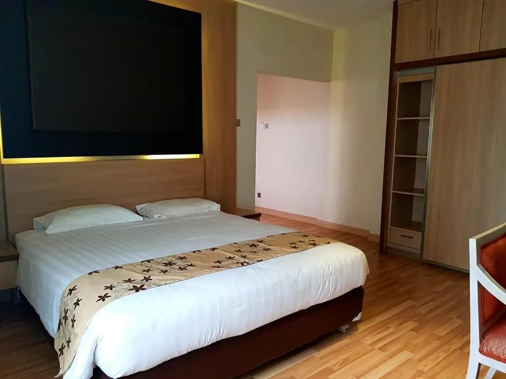 Bed in Mutiara Suites