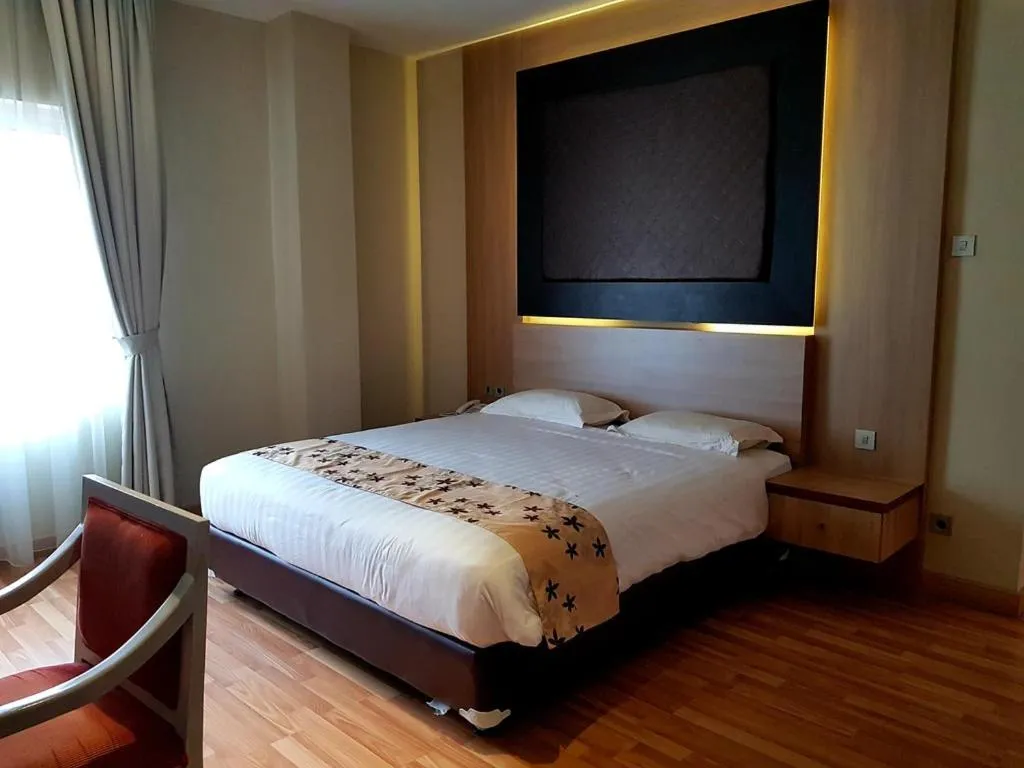 Bed in Mutiara Suites