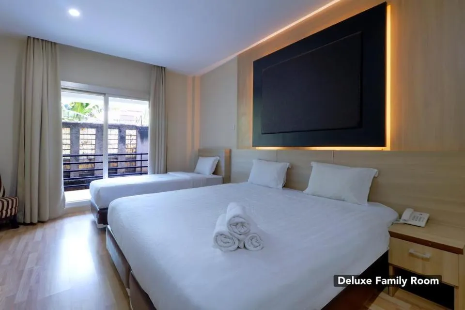 Bed in Mutiara Suites