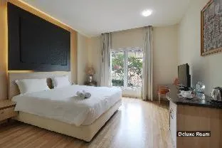 Bed in Mutiara Suites