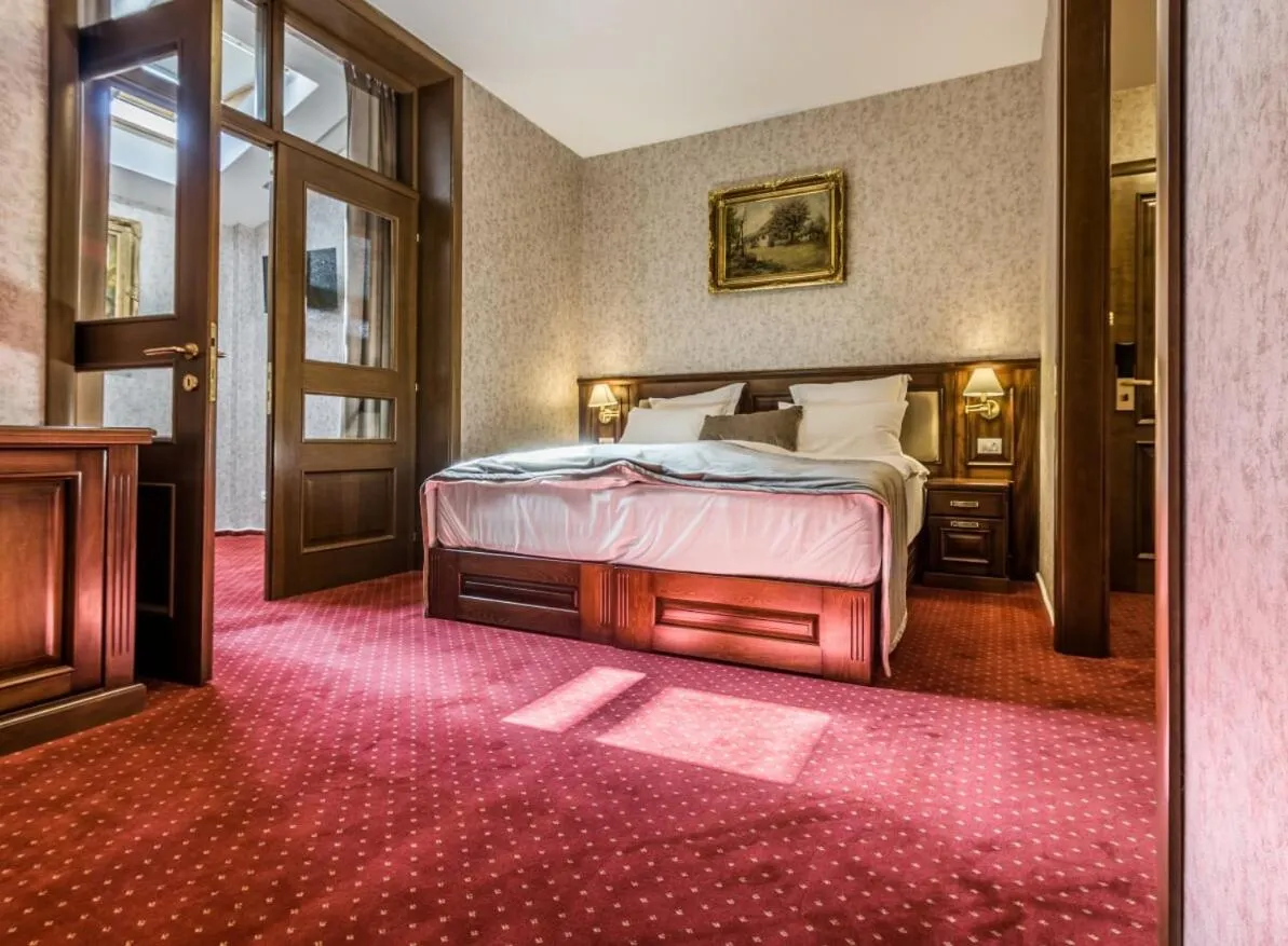 Bed in Noblesse Boutique Resort