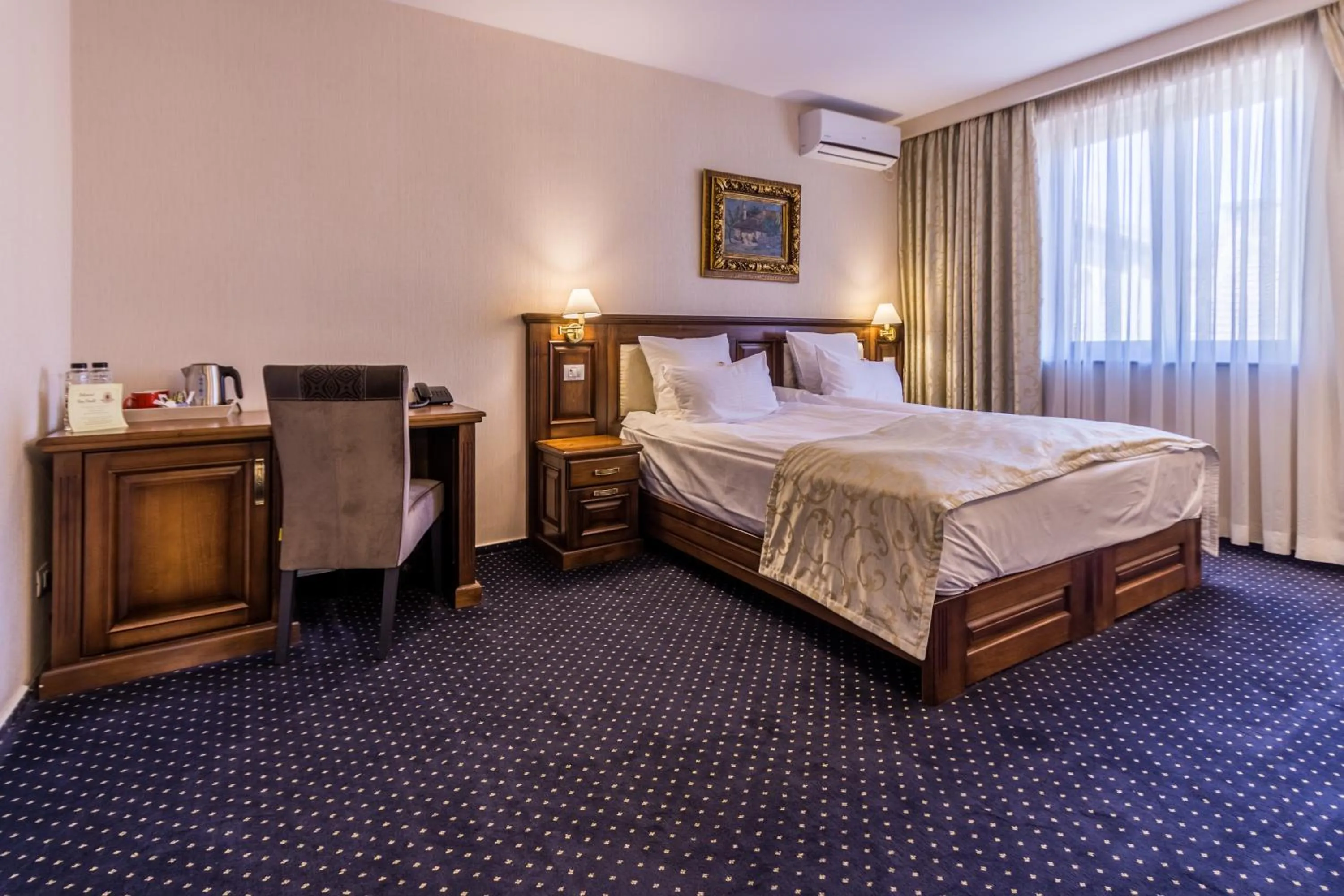 Bed in Noblesse Boutique Resort