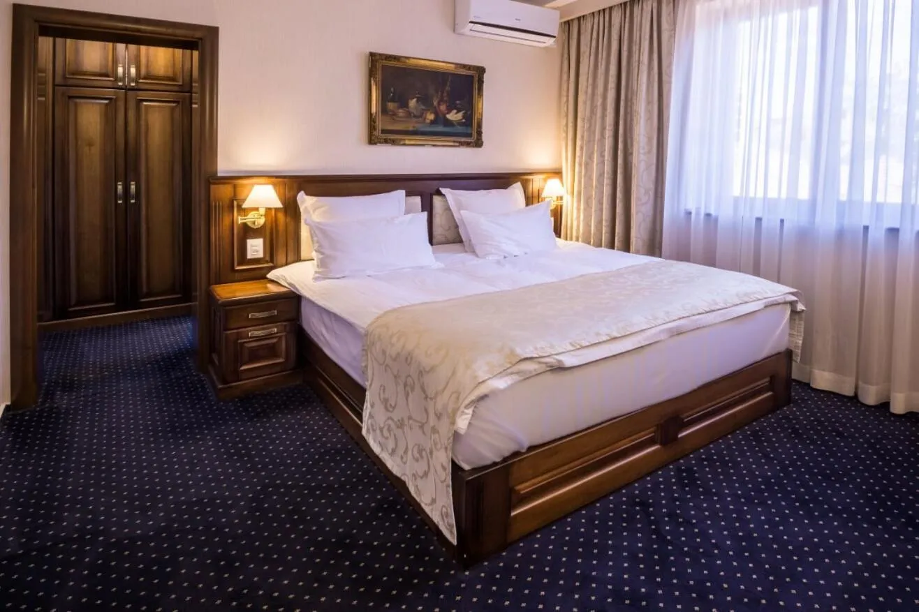 Bed in Noblesse Boutique Resort