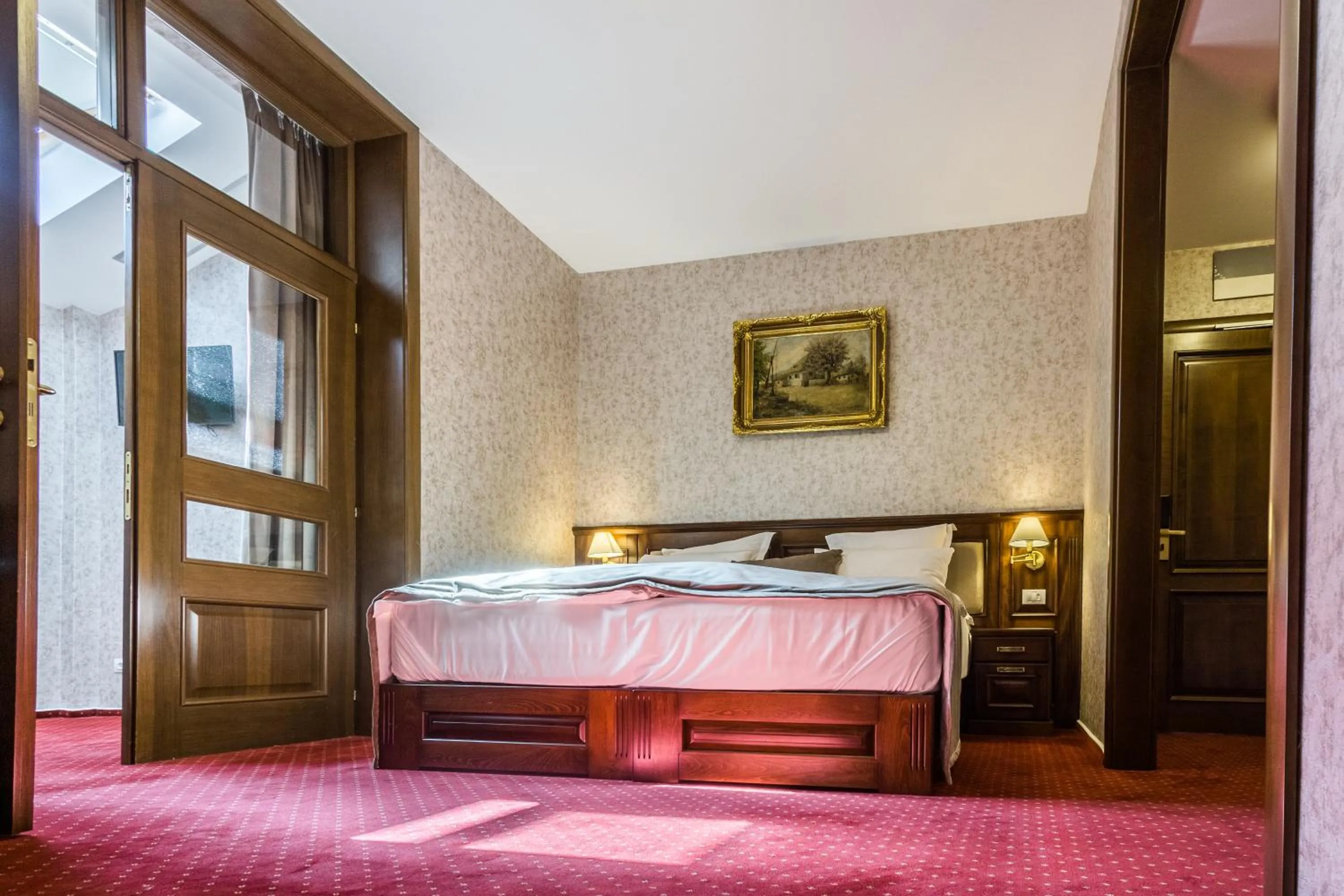 Bed in Noblesse Boutique Resort