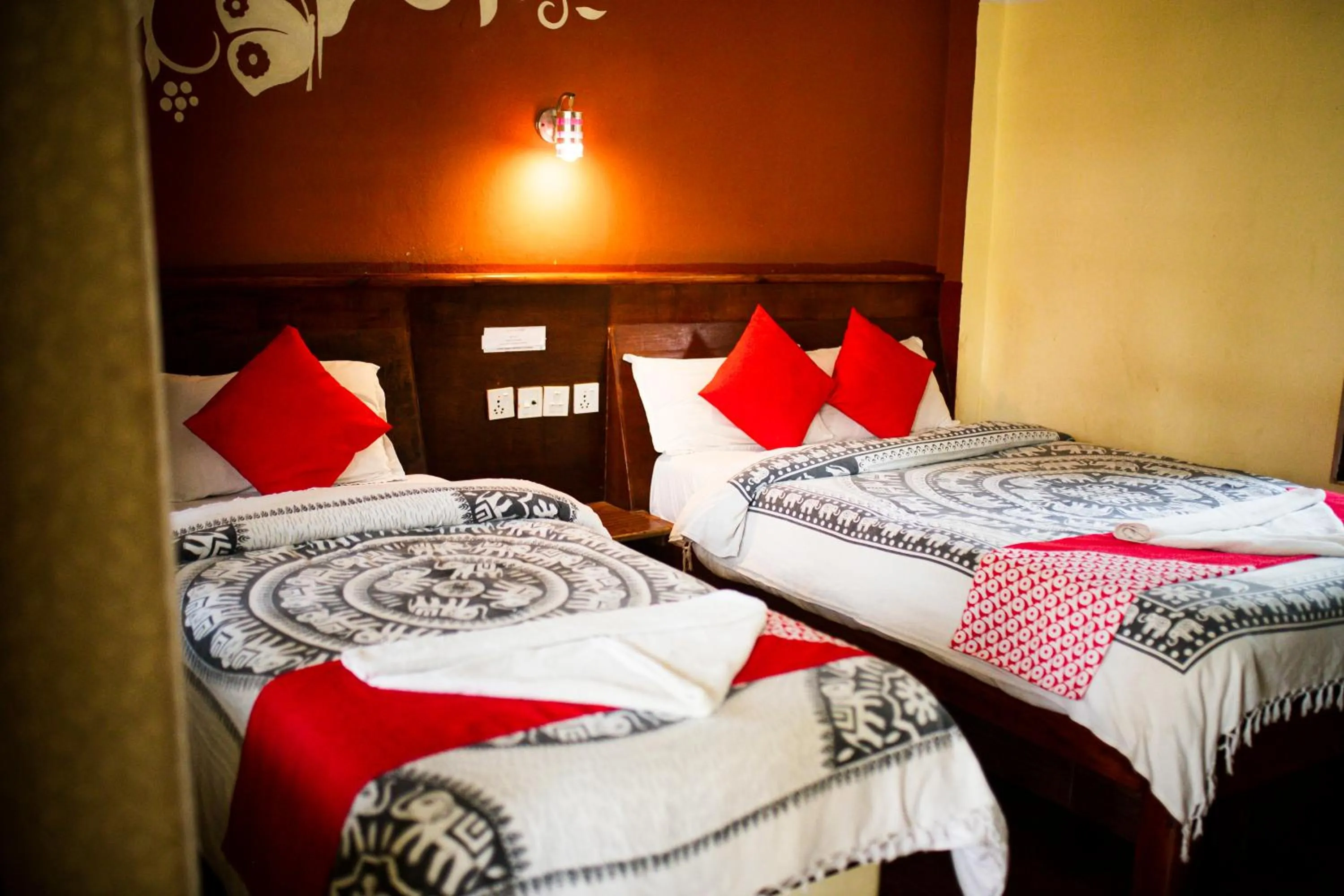 Bed in Chitwan Riverside Resort