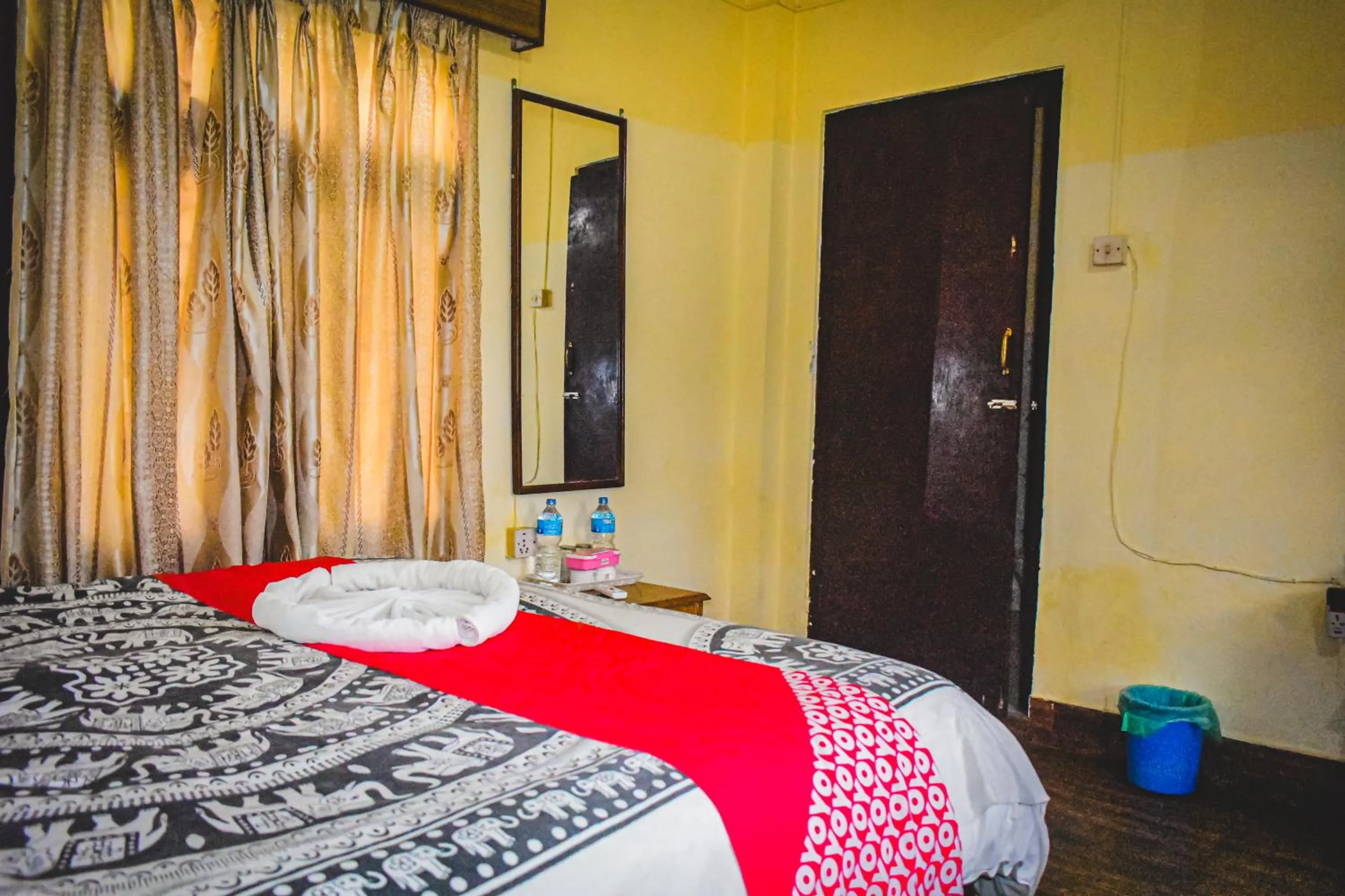 Bed in Chitwan Riverside Resort