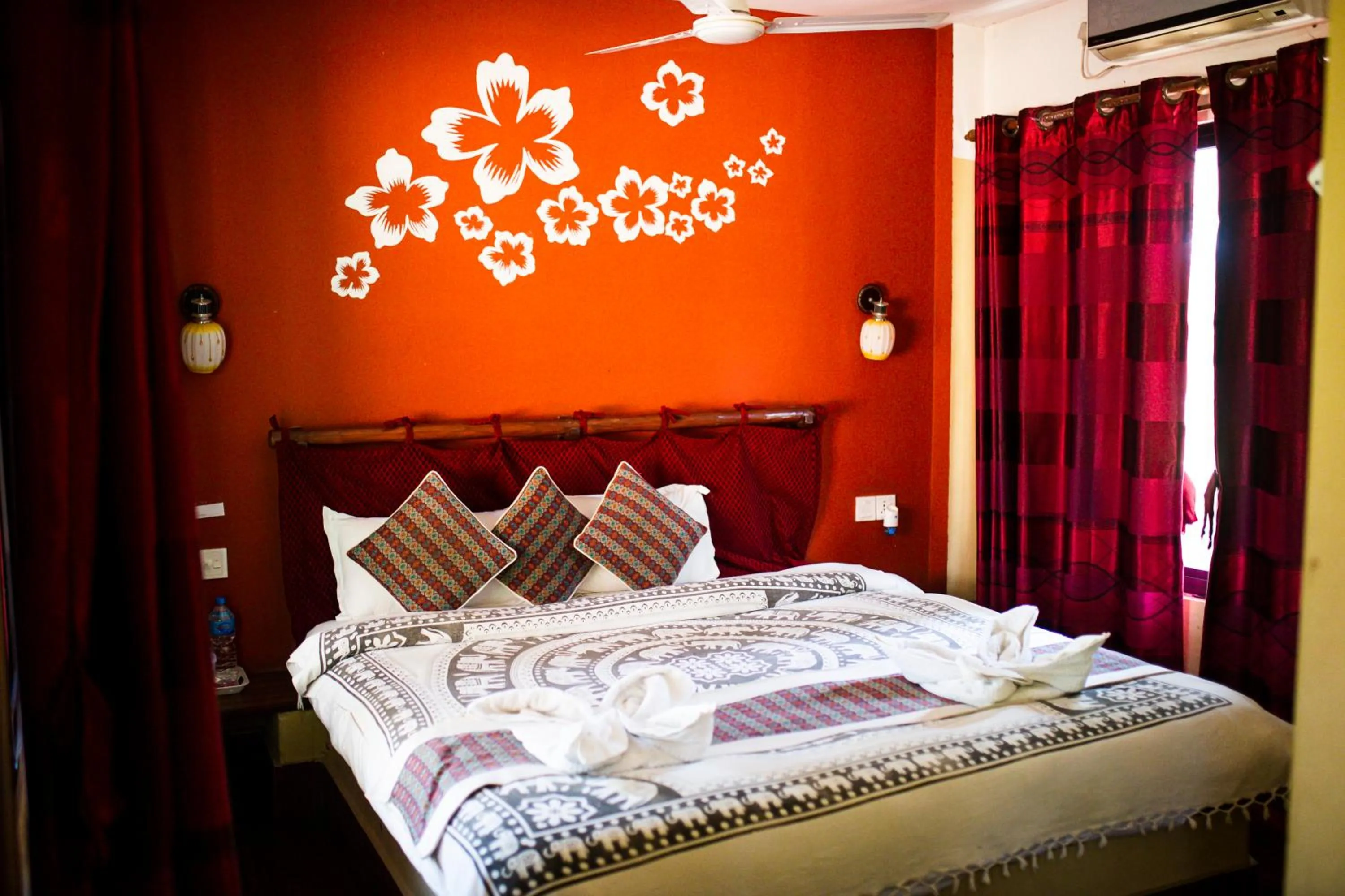 Bed in Chitwan Riverside Resort