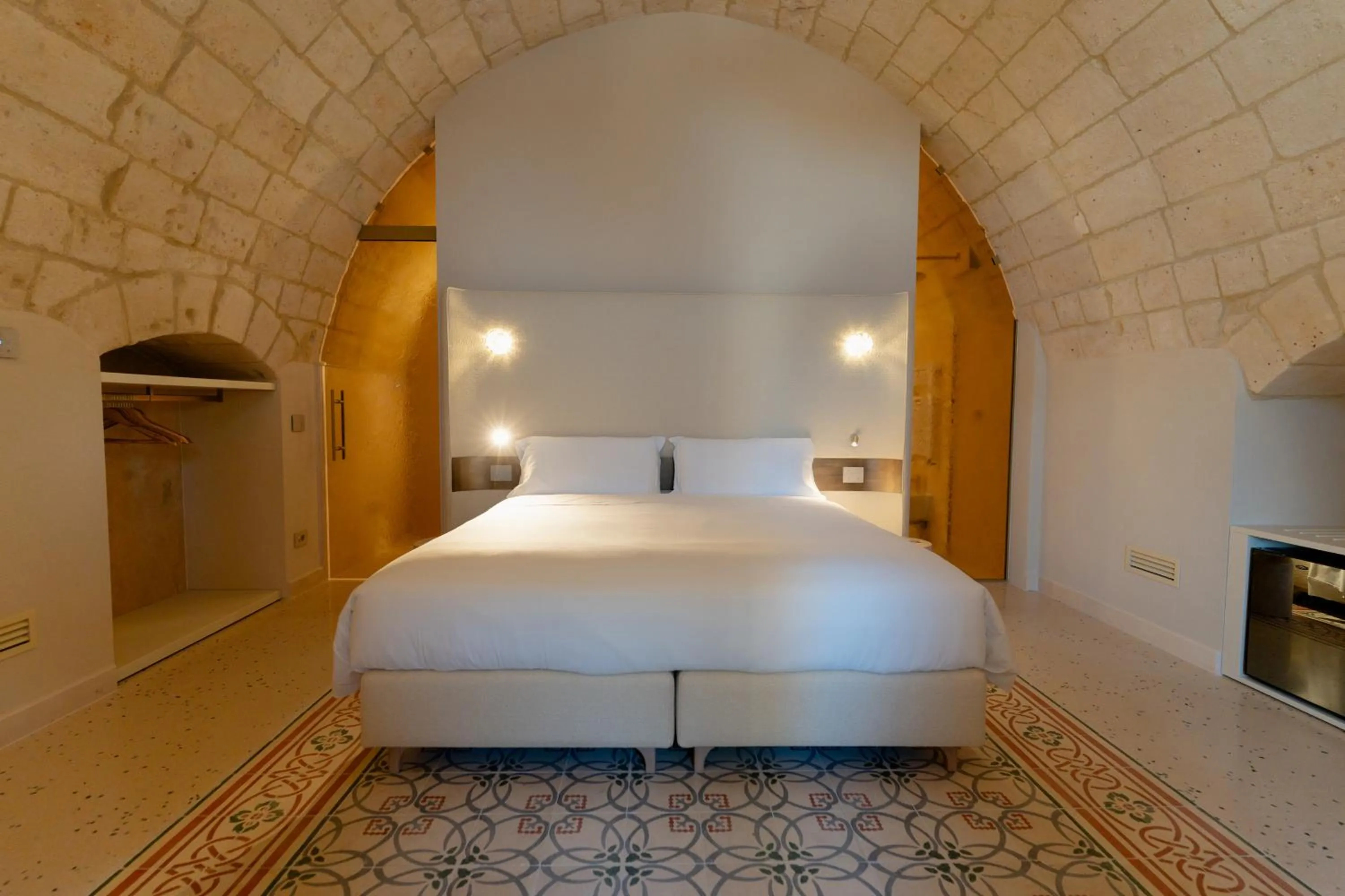 Bed in Palazzo Del Duca Hotel & Restaurant