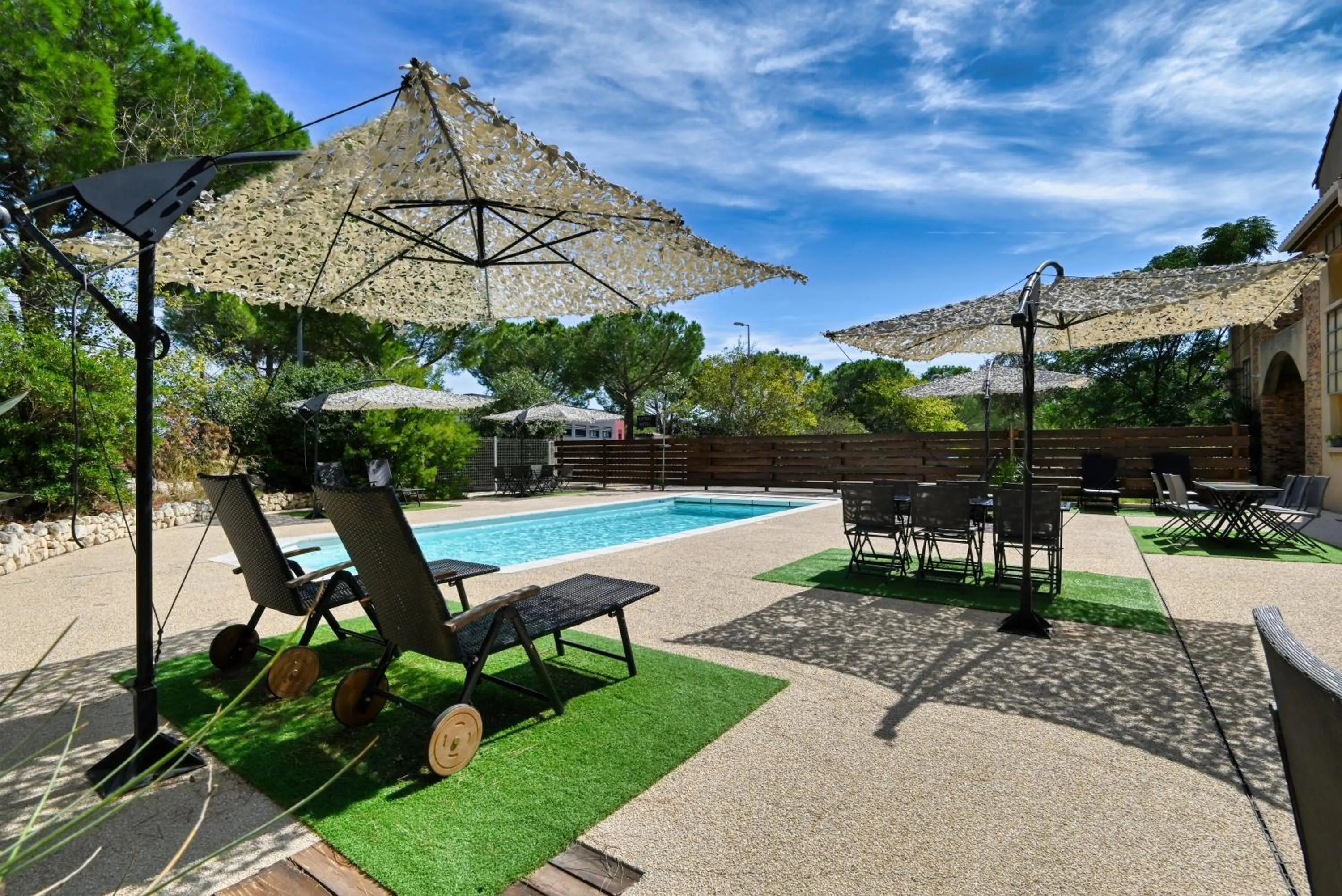 Swimming pool in Villa Martégale Hôtel Restaurant