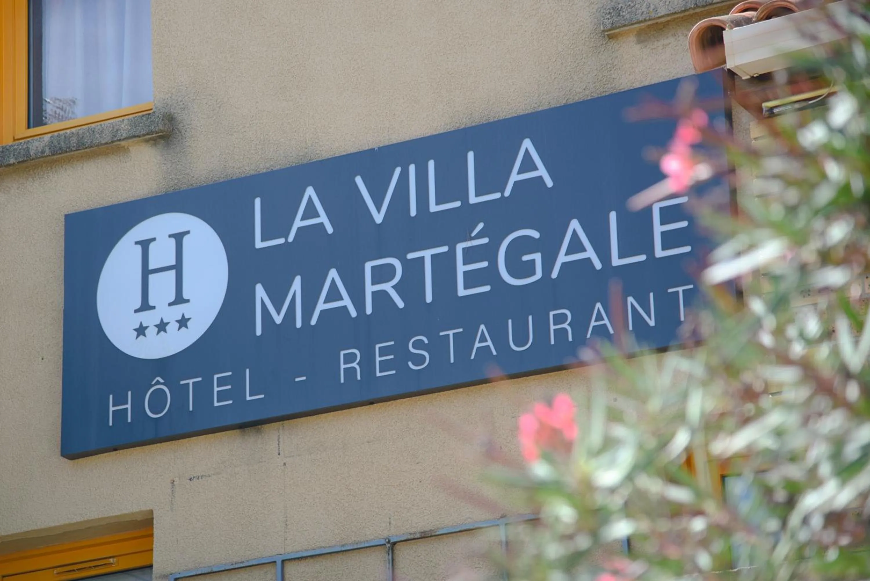 Property logo or sign in Villa Martégale Hôtel Restaurant