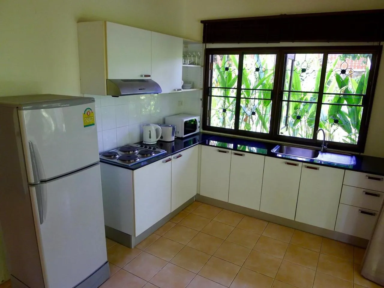 Kitchen or kitchenette in Symphony Villa
