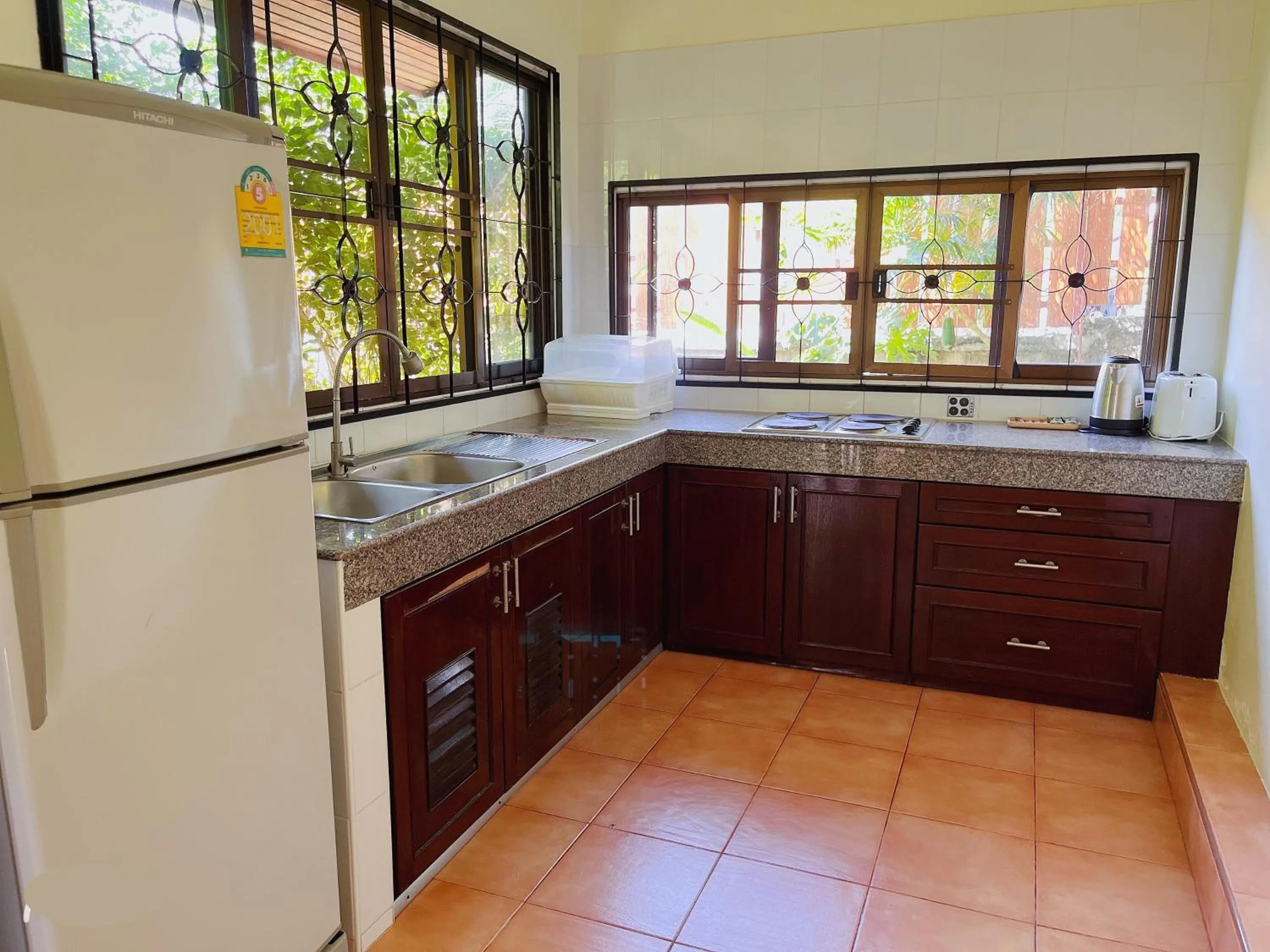 Kitchen or kitchenette in Symphony Villa
