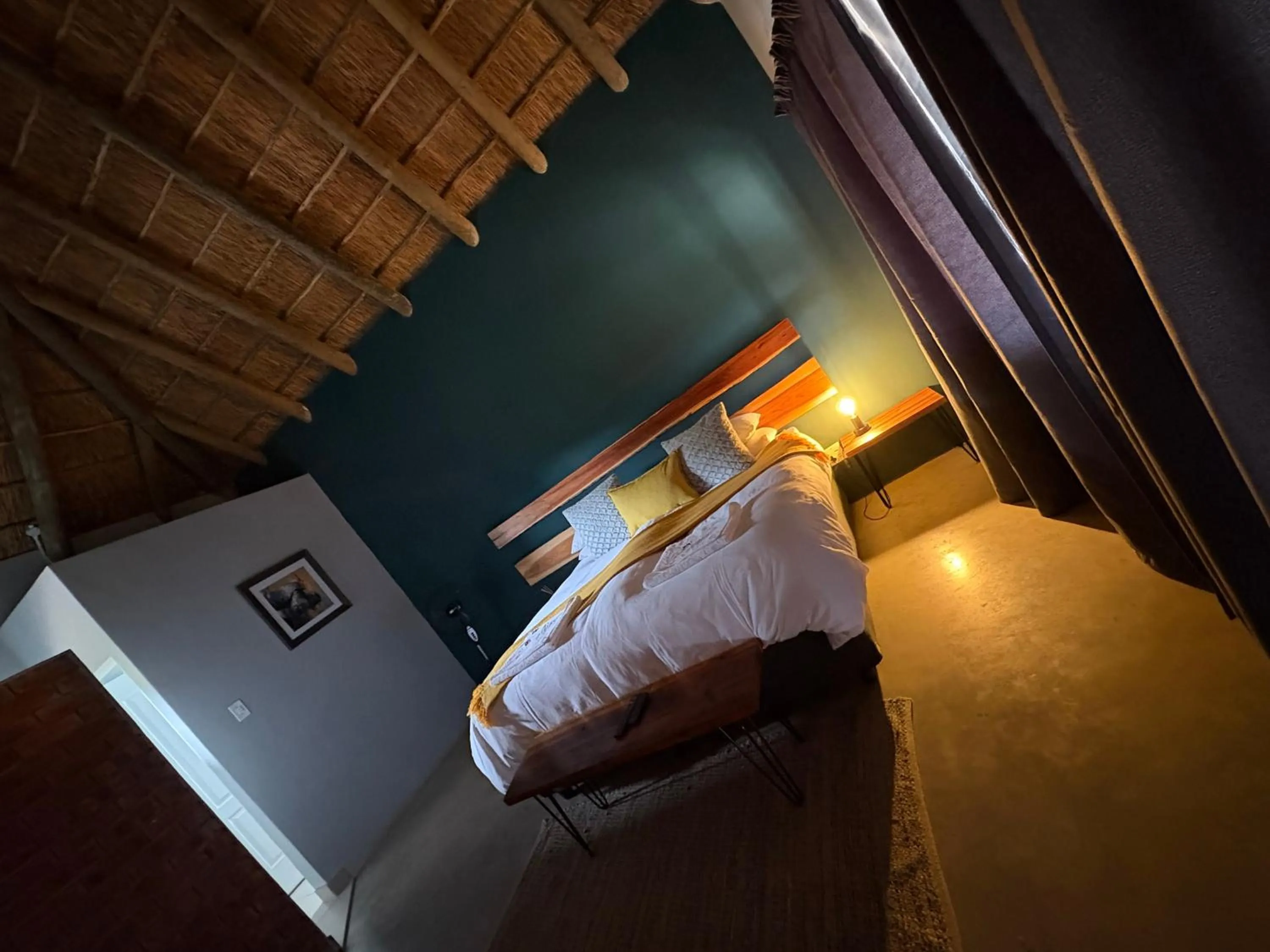 Bed in Klein Karoo Game Lodge