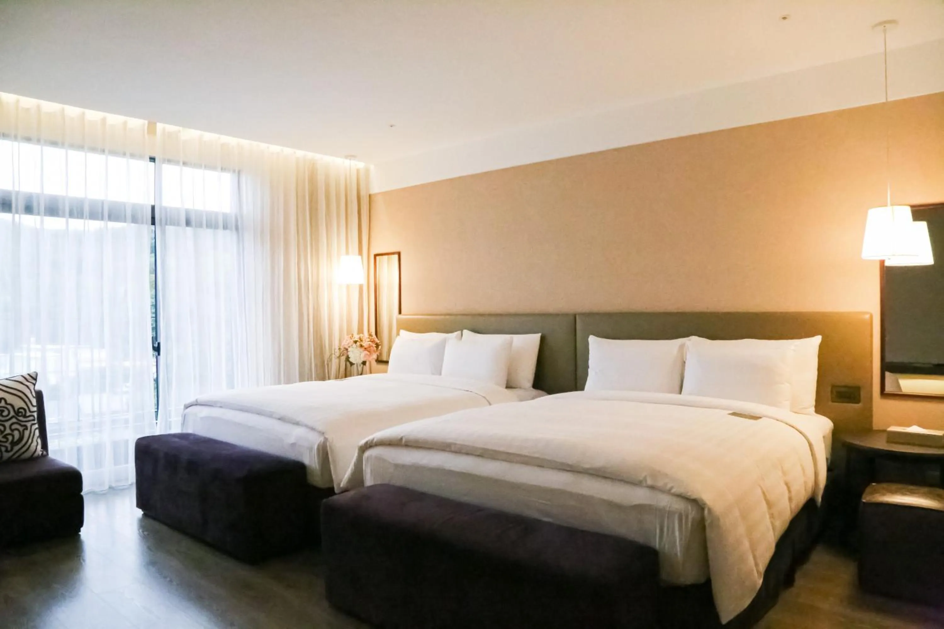 Bed in The Gaya Hotel