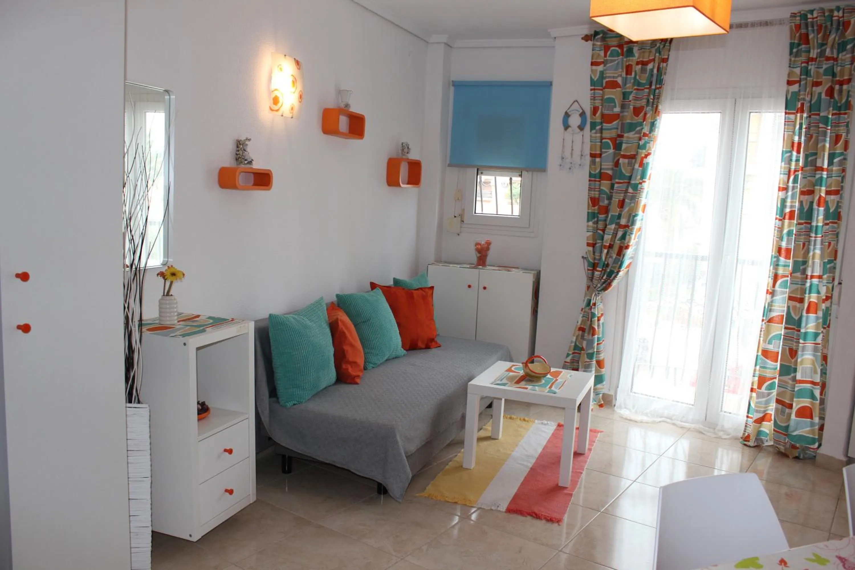 Living room, Bed in Apartamento Orange