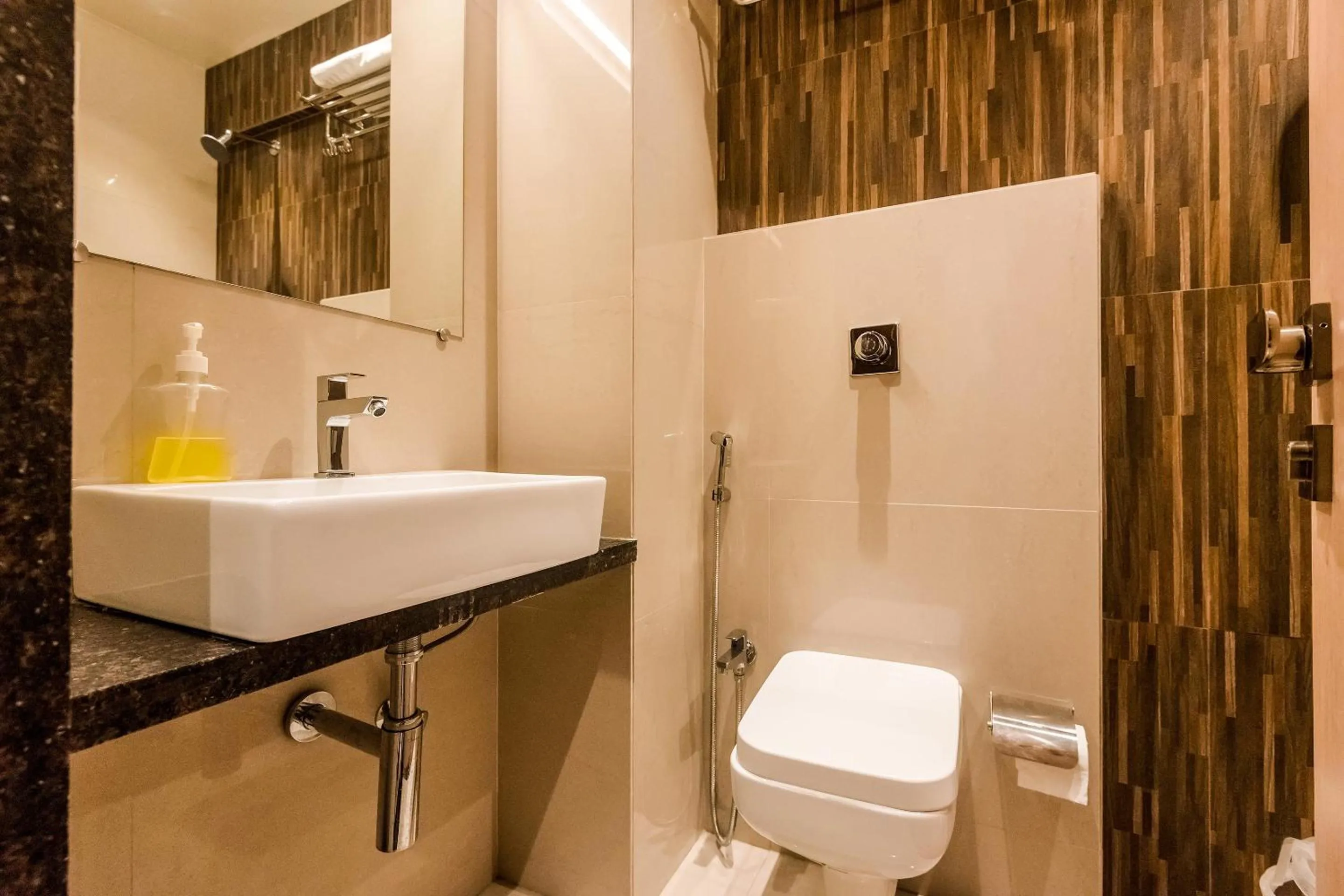 Bathroom in Capital O Hotel Konar Inn